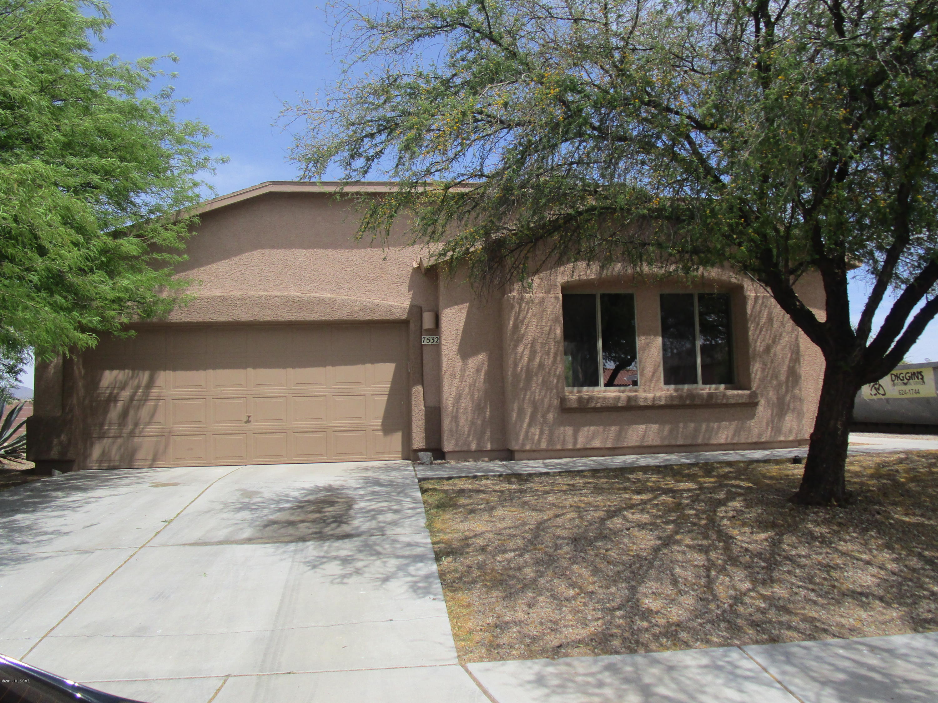 Move-in Ready!  Updated with new two-tone paint, new tile in living areas, and new carpet in bedrooms.  Bright, open floorplan.  Kitchen has new appliances including microwave. Master bath with dual sinks and walk-in shower. Two car garage with epoxy paint.  Large yard with block wall and great mountain views.