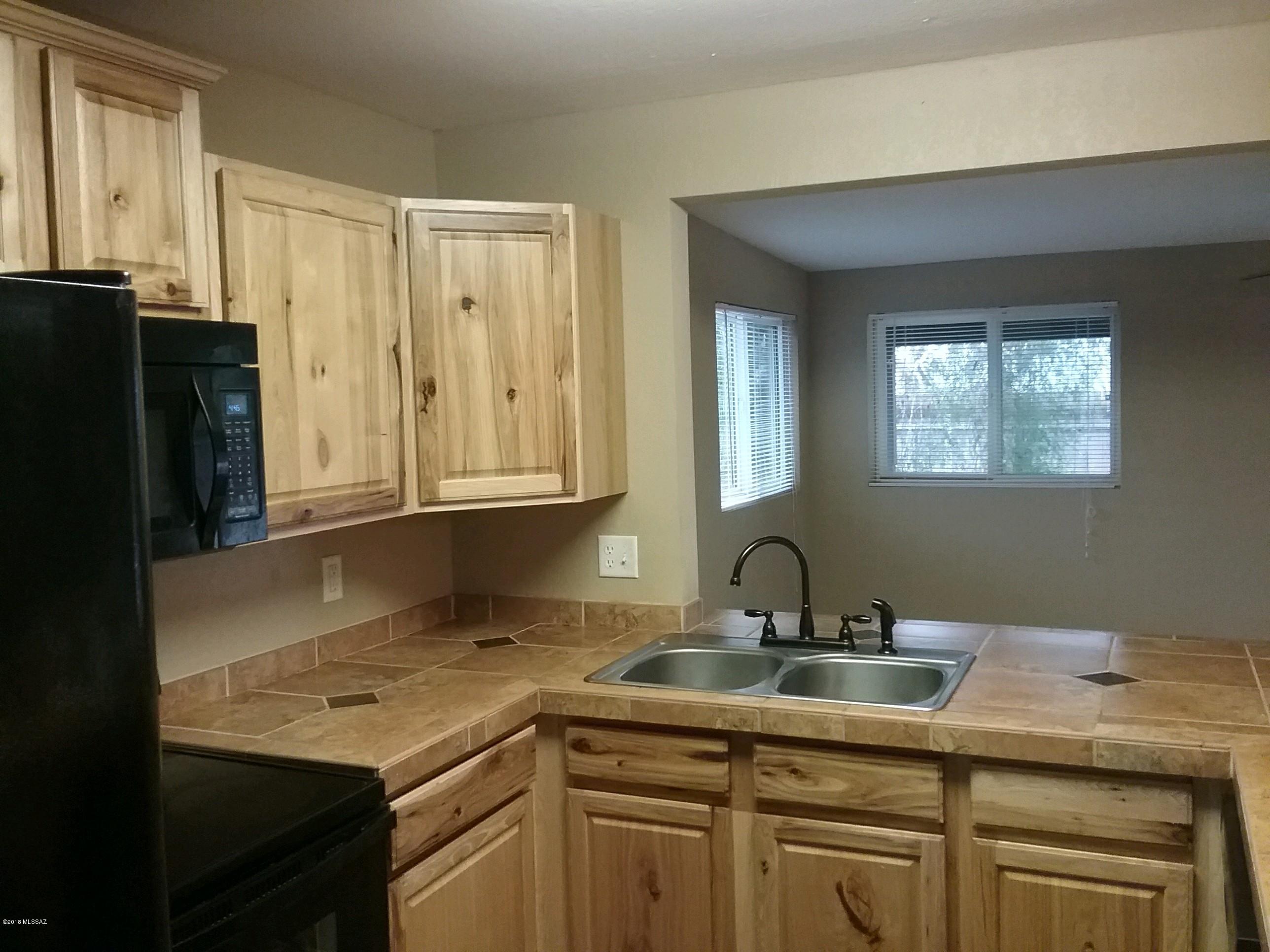 Charming 1,210 sq.ft. ''dollhouse'' of a home ~ recently remodeled with hickory cabinets, newer appliances, custom tile, carpet in the bedrooms ~ Central AC ~ fireplace~ lovely dining/kitchen area ~ carport ~ near Lakeside Park!  

The lease is a minimum one year, rent is $1025.00 a month plus $1025.00 security deposit and the application fee is $55.00 per adult.