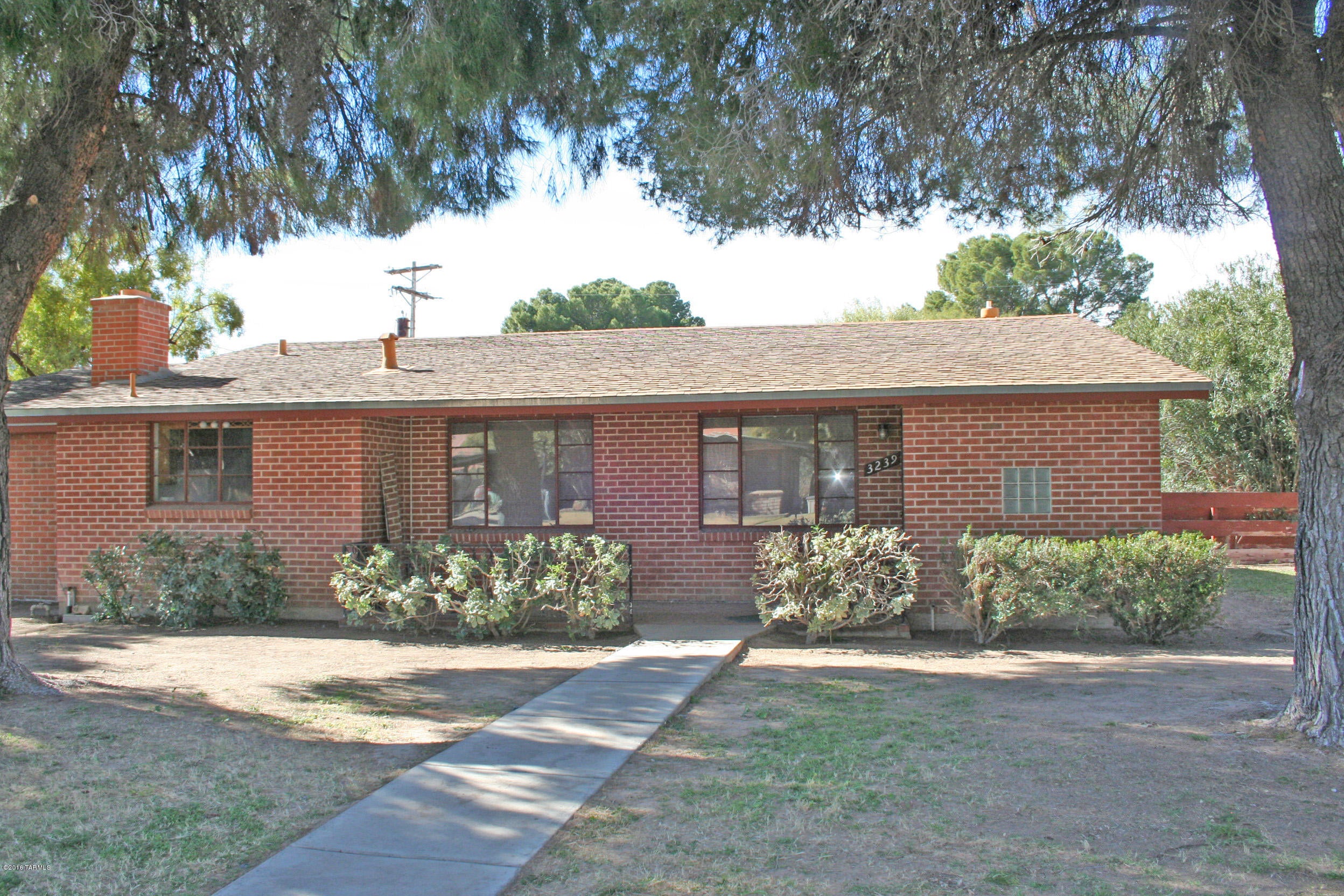 Built in 1958 this classic brick home in Winterhaven features updated bathroom and kitchen. Included appliances are oven/stove, micro, fridge, and dishwasher. 3 bedrooms, large fenced back yard, large storage area with laundry room, covered patio and mature trees.  Enclosed carport is for storage use only, not livable space.  Fireplace is decorative only.   Pets are subject to approval.  Security deposit $1445.00 *** RENTAL RATE REFLECTS A $65 CONCESSION IN EXCHANGE FOR TENANT'S AGREEMENT TO CHANGE HVAC FILTERS MONTHLY. RENTAL RATES ARE $65/MO HIGHER THAN STATED W/O CONCESSION.***