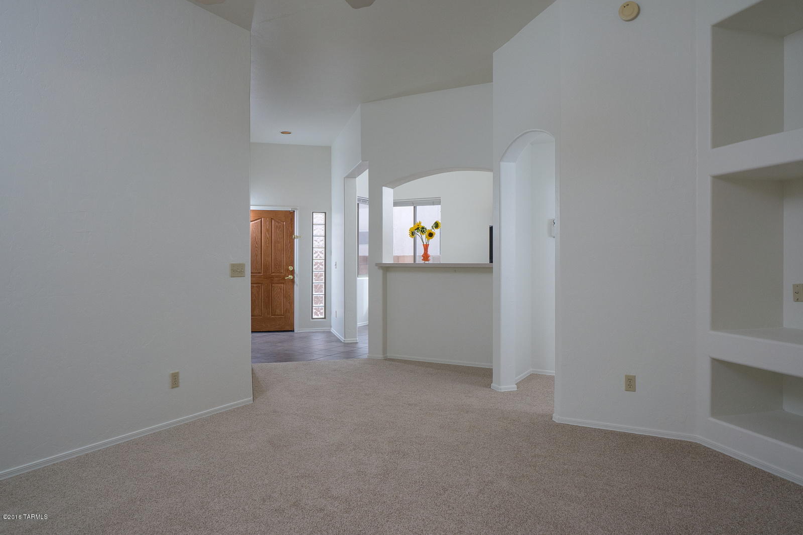 2001 Gated, Close-in NE Foothills at Sabino Canyon & Tanque Verde, by AF Sterling.  Prime Location - Close to Tucson Country Club, Udall Park, Sabino Canyon, Popular Restaurants, Shopping and Bus.  Beautifully Maintained and Move-in Ready.  Just Painted Inside & Out plus New Carpet and Window Replacement.  High Ceilings, Fabulous Lighting, Seamless Floor Plan, Split Bedroom-Great Rm Concept.  Charming Patio/Yard with Citrus Trees,  just the right size and setting to enjoy.  Exceptional Neighborhood Amenities include 3 state-of-the-art Pools & Spas, Front Yard Maintenance and TPD Roving Security.  Keep it Simple; you'll love living here!    Truly a lock-up-and-go residence, perfect for seasonal or year 'round living.