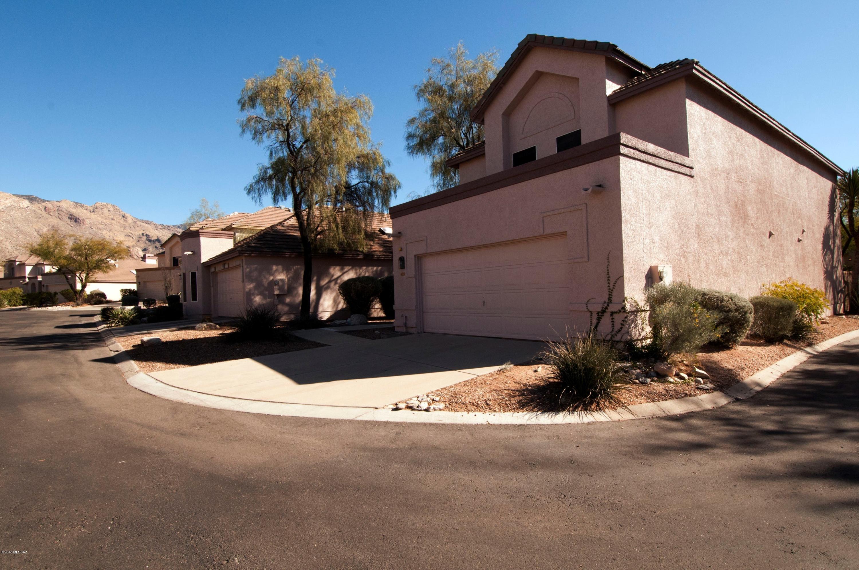 This corner lot, 3 bedroom, 2.5 bath home on a cul de sac within the gated golf course comm. of La Paloma which offers a comm. pool, spa, walking paths, and outstanding mt. views, is a nice find! Sellers has owned this home for years and has taken good care of it! The master bedroom has a balcony off it for those relaxing nights or early morning coffee. Corian island counter top in the kitchen offer a nice accent. Laundry room off the kitchen, and a separate breakfast area too. The kitchen is open to the family room that leads to the covered patio backyard area. The living room has vaulted ceilings and a fireplace. the home is adjacent to additional parking for guests. The HOA covers trash, 24 hr. man guarded gate, front yard maintenance, comm.pool & spa and more! Pride of ownership!