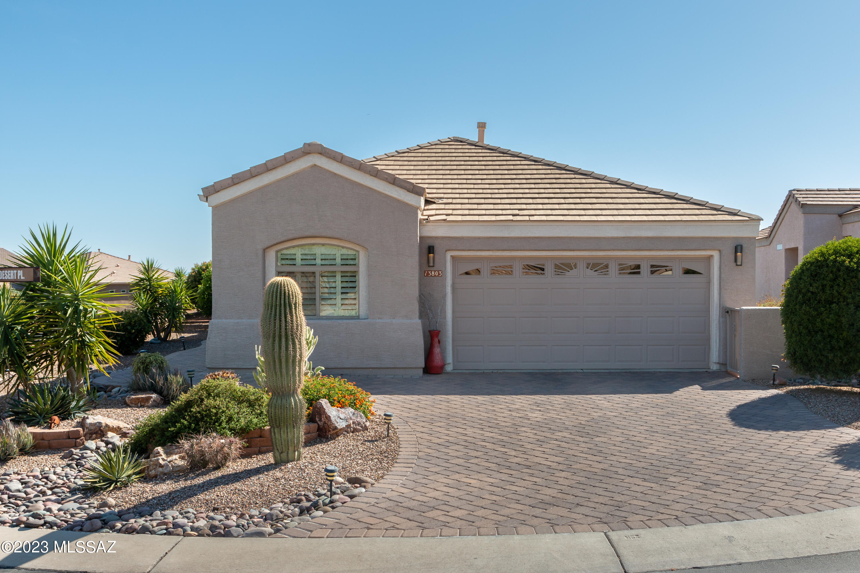 Enjoy all that Heritage Highlands, a 55+ community in prestigious Dove Mountain, has to offer from this immaculately maintained home. This Chesapeake model (1601 sqft, 3 bed, 2 bath) has been tastefully updated, including: quartz counters and tile backsplash in the kitchen; tile shower in the primary bathroom; & plantation shutters throughout the home. Other features include an EV charging outlet in the garage, retractable sun shade over the rear patio, a built-in BBQ, & a whole house water softener. In the backyard, relax under the covered patio as the sun sets, or enjoy dusk from the hot tub. Much of the furnishings are available on a separate bill of sale. Amenities in the Highlands include golf, pool, tennis & pickleball courts, exercise facilities, craft rooms, a restaurant, & more!