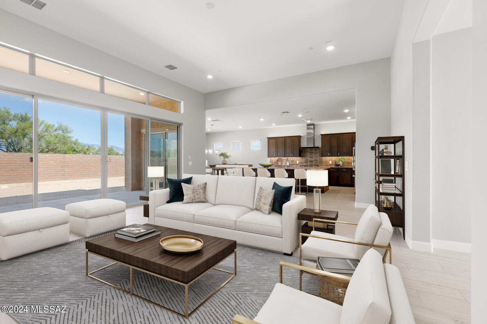 FINAL OPPORTUNITY!!  SPECIAL PRICING ON THE LAST HOME IN THE COMMUNITY Introducing the Summit floorplan with Sonoran elevation is a testament to luxury & modern living. This 3-bedroom home features a versatile den and an inviting open great room concept that seamlessly combines living, dining, and kitchen areas. The foyer and Owner's suite boast coffered ceilings, elevating the aesthetic appeal. The kitchen is equipped with top-of-the-line Jenn-Air appliances, a convenient center island, walk-in pantry, and elegant granite countertops. The den, accessed through French doors, adds a touch of sophistication. Enjoy the outdoors on the expansive back patio accessed thru 16' sliding glass door. Owner's Suite features walk-in shower, dual sinks & spacious walk-in closet.