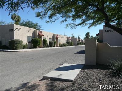 Stunning Santa Fe Townhome in quiet, well maintained complex! Energy efficient windows and AC. Cozy fireplace in spacious living room. Two large bedrooms each with a bath! Detached carport with additional storage! Big covered patio opens to fenced yard perfect for kids and approved pet!! Huge laundry room with washer and dryer hookups. This unit is gorgeous and waiting for you!! CALL TODAY!!