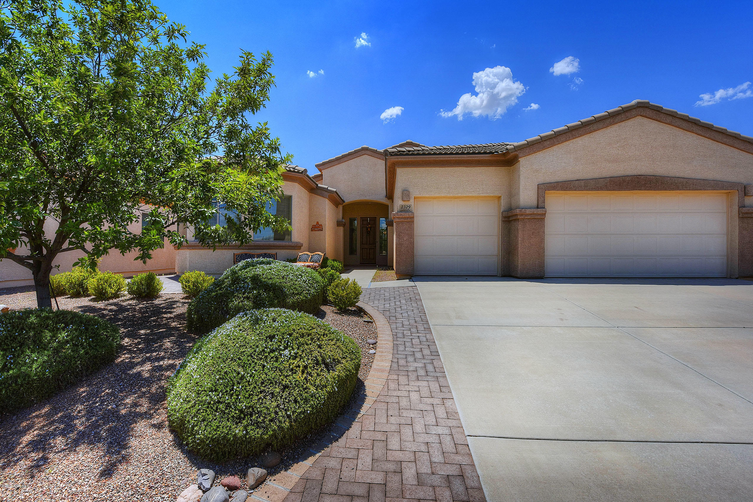 Surrounded by magnificent mountain ranges on all sides you will find this lovely like new home in the Gated Canoa Northwest community. This spacious move-in-ready, Granville Model features a Split Floor-Plan with 3 Bedroom 3 Bath, 3 Car Garage, Den, Screened Porch, a wonderful large kitchen with Island & Corian Counters, exquisite Master Suite with an amazing bath that features dual sinks, separate tub & shower, & large walk-in closet. Some of the many tasteful upgrades include Plantation Shutters, Professional Landscaping, Roll Out Shelves, New Stove, New Washer a beautiful fireplace & much much more.. Membership in GVR gives access to world class recreation centers and an indoor pool minutes from your new home! Come see it before its gone!