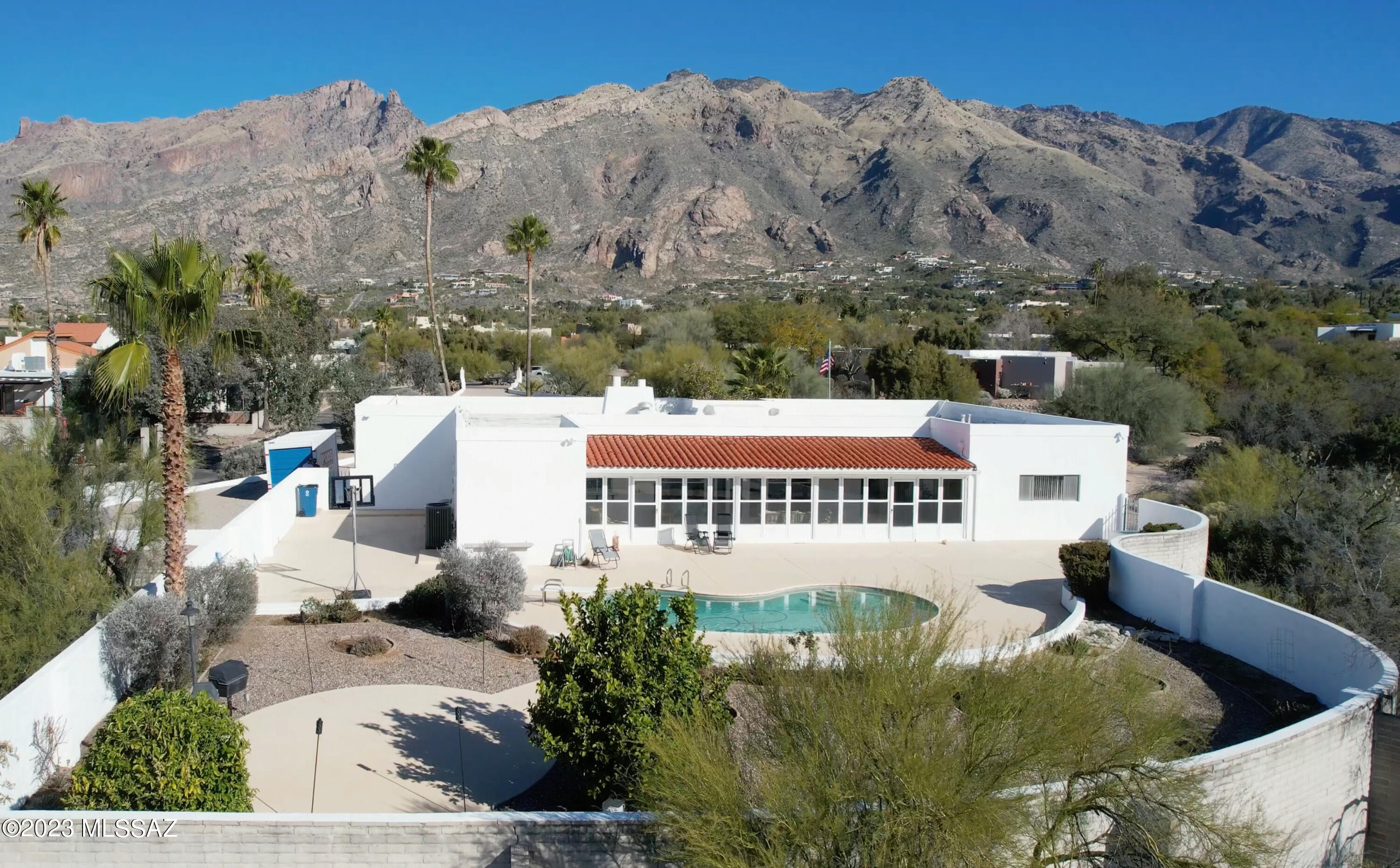 Beautiful and spacious territorial 4 bedroom/3 bathroom home in Skyline Bel Air Estates sits on a gorgeous 1.93 acre lot with spectacular mountain views. Perfectly located near Swan and Sunrise, this home has a large backyard with a pool and is perfect for entertaining. Two new HVAC units installed 11/24/22. This 3,631 SqFt split floor plan territorial home has good natural lighting and a long circular driveway with ample parking. Don't miss out on your opportunity to live in this fantastic location!