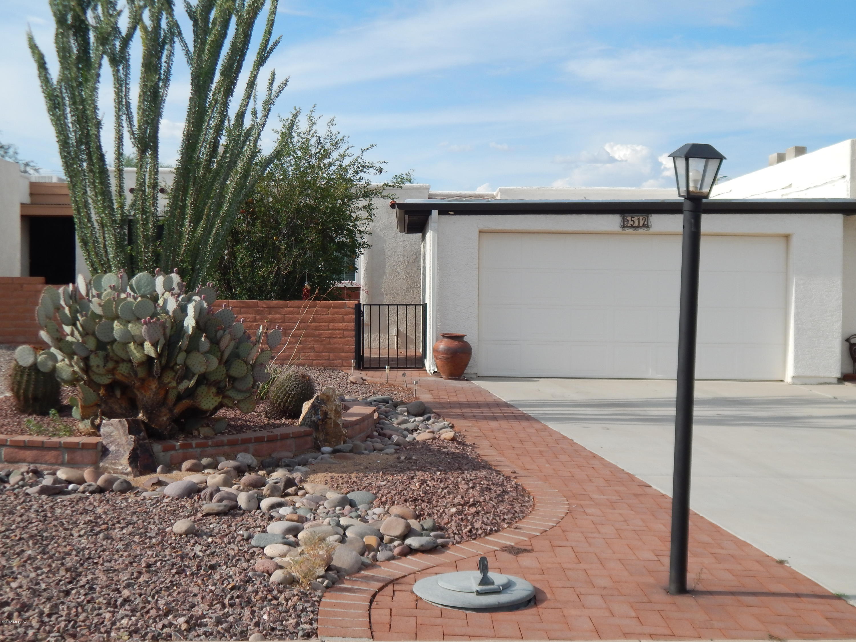 Private back yard abutting desert area, with raised, paver patio. Updated kitchen with hardwood cabinets, quartz counters, open concept with breakfast bar. Front courtyard provides additional out door living space with easy care landscaping. Perfect for entertaining.
GVR is available but NOT required.