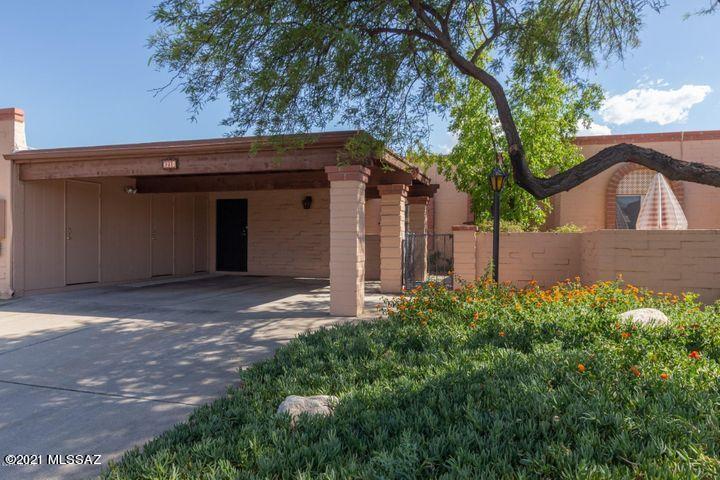 Charming 3 bed, 2 bath townhouse located in the heart of Tucson in the quiet McCormick Place community, offering a sparkling pool and spa. This home features spacious bedrooms, an inviting living area with a cozy fireplace, and a kitchen with abundant cabinet space. Enjoy the adorable front courtyard and private paved backyard, perfect for relaxing or entertaining. Additional highlights include an in-unit washer and dryer, two-car carport, extra-large storage room, and a private covered patio. Ideally situated near TMC, popular restaurants, shopping, and the Rillito River bike path, this home combines convenience, comfort, and charm in a desirable central location.