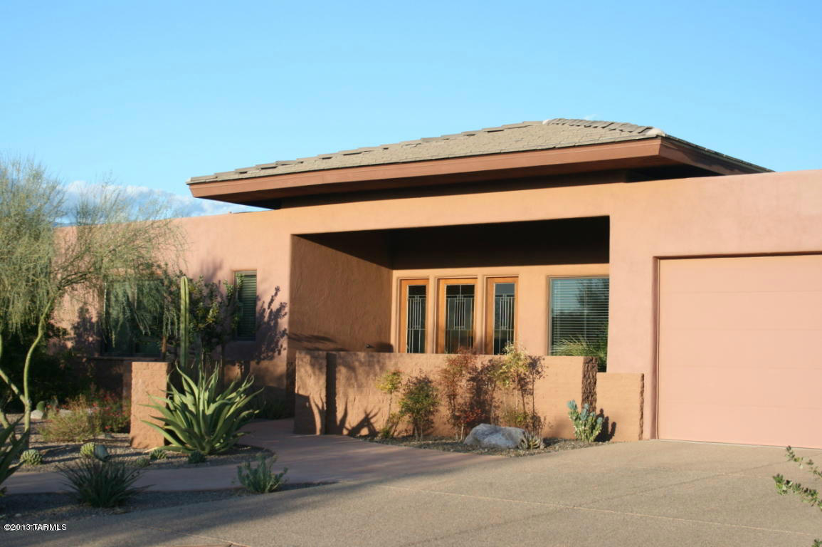 Located in the World Renowned Canyon Ranch Health Resort. This immaculate home allows access to state-of-the-art fitness, medical and spa facilities and gourmet dining. Home features open great room, eat-in kitchen, 2 bedrooms with in-suite baths, plus powder room. This amazing home combines casual, functional living, with contemporary elegant interior and two car garage. Experience serenity and beauty both inside and out while enjoying amazing Tucson mountain views. A ready-to-move-in; turn-key opportunity. Furnishings negotiable.