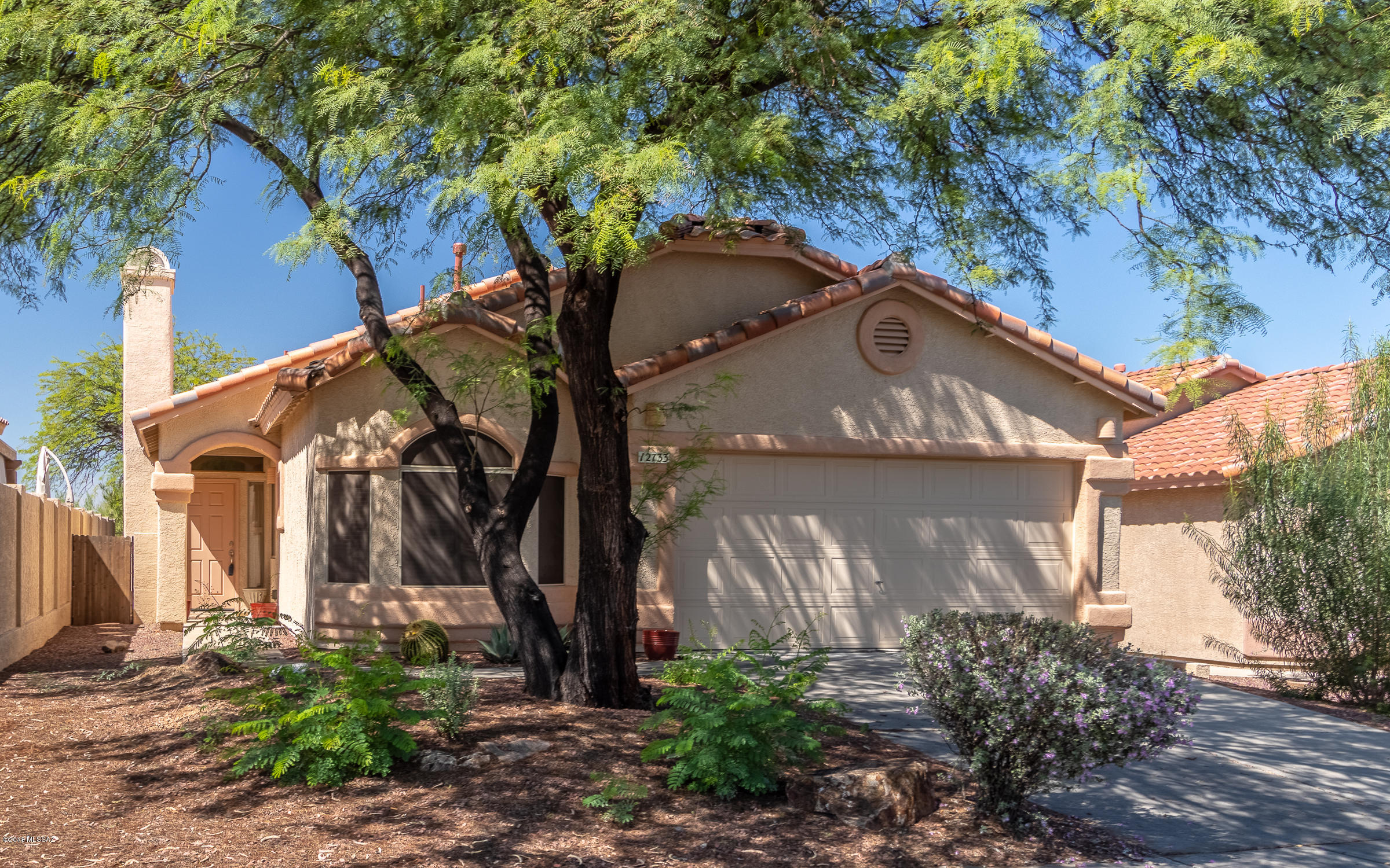 Move in Ready 3br/2 bath plus a large den. Prime lot that is open to the desert in a great Oro Valley location. Vaulted ceilings, large covered patio, mature landscaping, spacious floor plan and so much more.  Move in ready! Will go fast