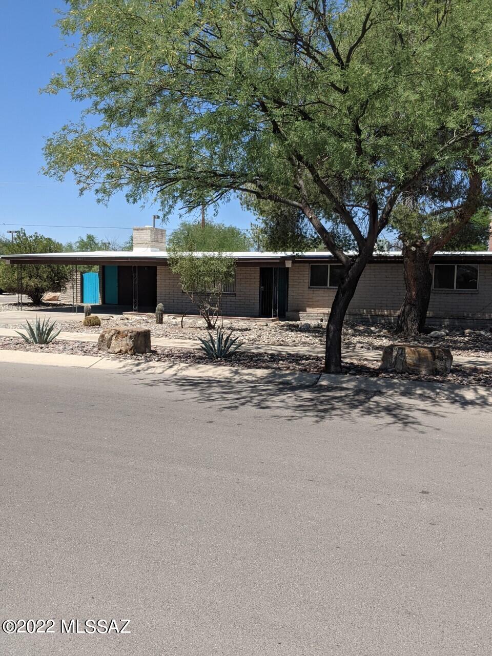 Awesome 3 bedroom 2 bath home, wood burning fireplace in the family room, ceiling fans, new light fixtures throughout, updated bathrooms, new paint inside and new carpet in the bedrooms, covered rear patio, spacious rear yard with 6 ft block wall. Property is convenient to River walk, shops, stores, doctors offices, park, and Tucson Mall. This property is clean and ready now!