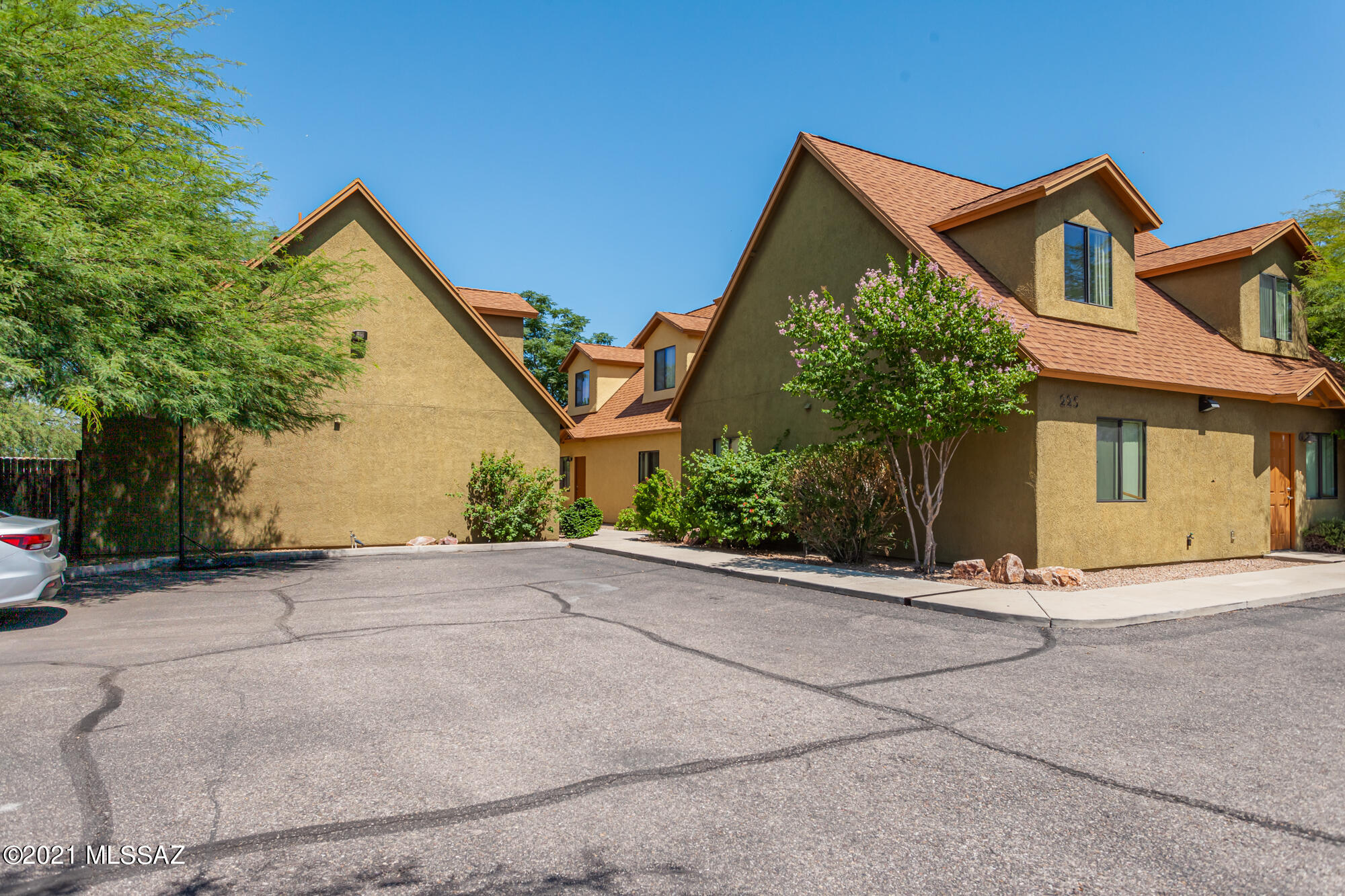 Amazing rental investment opportunity with 3 HOUSES on 1 LOT in wonderful location within biking distance to University of Arizona. 3 x Individual mini dorm style properties with 5 beds 2 baths each house. Total 15 beds 6 baths & 8 on-site lighted car parking spots. Modern contemporary build 2008. Each house has separate entrance and its own private backyard with covered patio. 2 bedrooms downstairs and 3 bedrooms upstairs. Indoor laundry. Landscaped courtyard and walk way. Very convenient & ideal location next to Biking Ave, near Banner UMC, grocery stores, schools, businesses, parks.