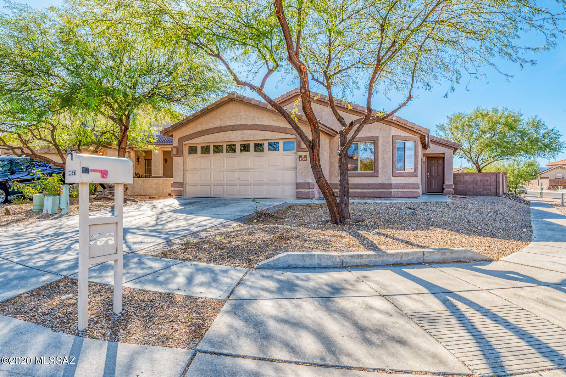 Have you been looking for a 4 bedroom, 2 bath home in the Vail School District? Well...here it is, your new home offers a split bedroom floor plan, beautiful tile floors in the common areas and carpet in the bedrooms. The 4th bedroom can be used as a den/bonus room the options are endless. The large kitchen has stainless appliances and lots of cabinets and room for your dining table. The master bedroom is large with a walk-in closet, private bathroom and dual sinks. You will also enjoy your covered patio with mountain views and listening to your surround sound outside while entertaining your guests. Your home also has Solar (leased) which will help with your electric during the year. Your new home is also close to shopping, restaurants, walking trails, parks and easy freeway access.