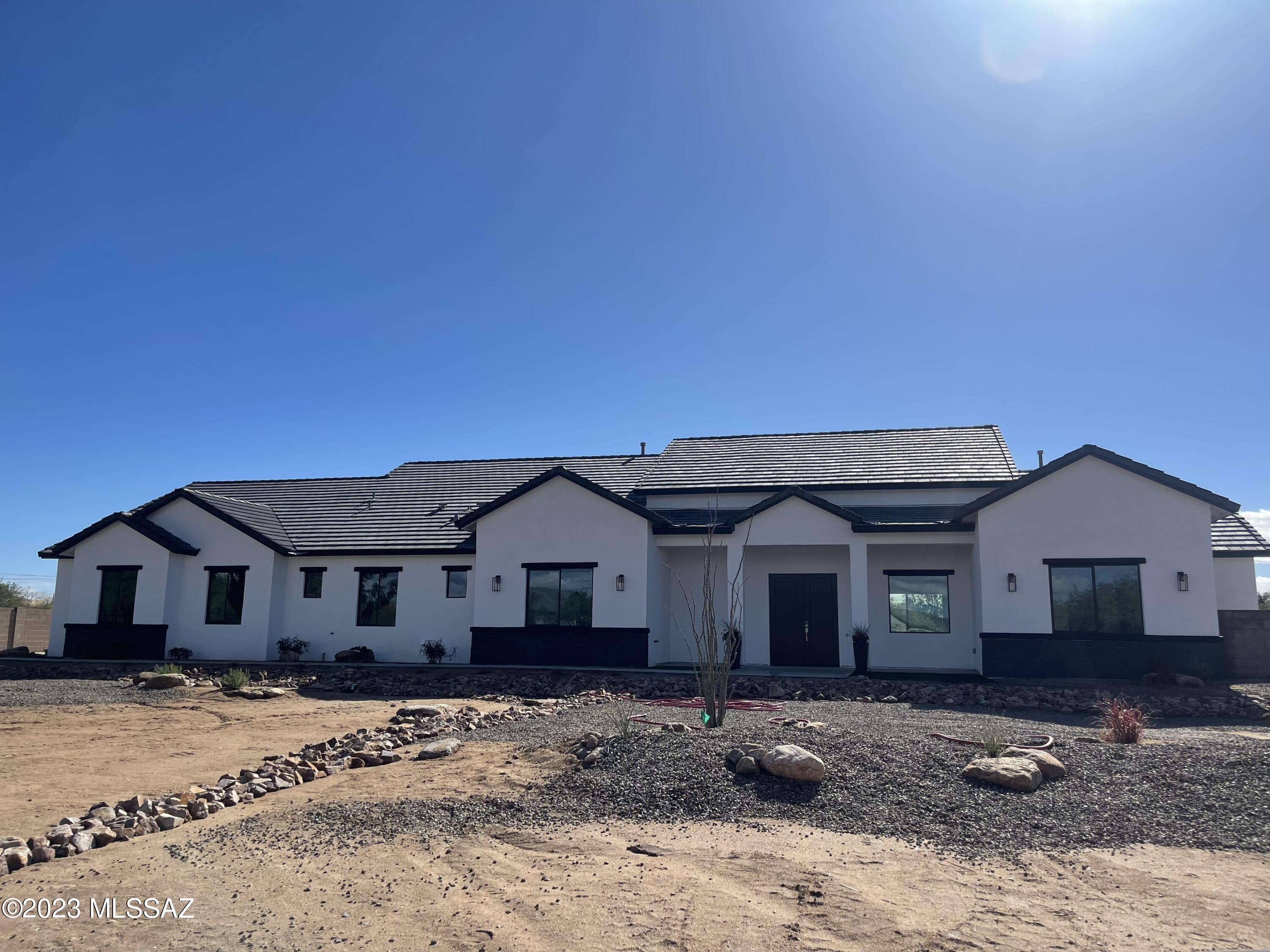 Stunning New Construction on almost an acre lot in a private gated community! This 4 Bdrm, 4 Bath plus bonus room, boasting 3,359 sqft. of living with beautiful 24''x48'' tile throughout. Light, bright split bedroom floor plan with white cabinets and Quartz countertops throughout, stainless steel appliances and large island. 3 car garage extra deep and storage closet. This home offers a great location and so much more. Don't pass this up! Listing agent is related to Seller. Pictures do not do justice, must see!