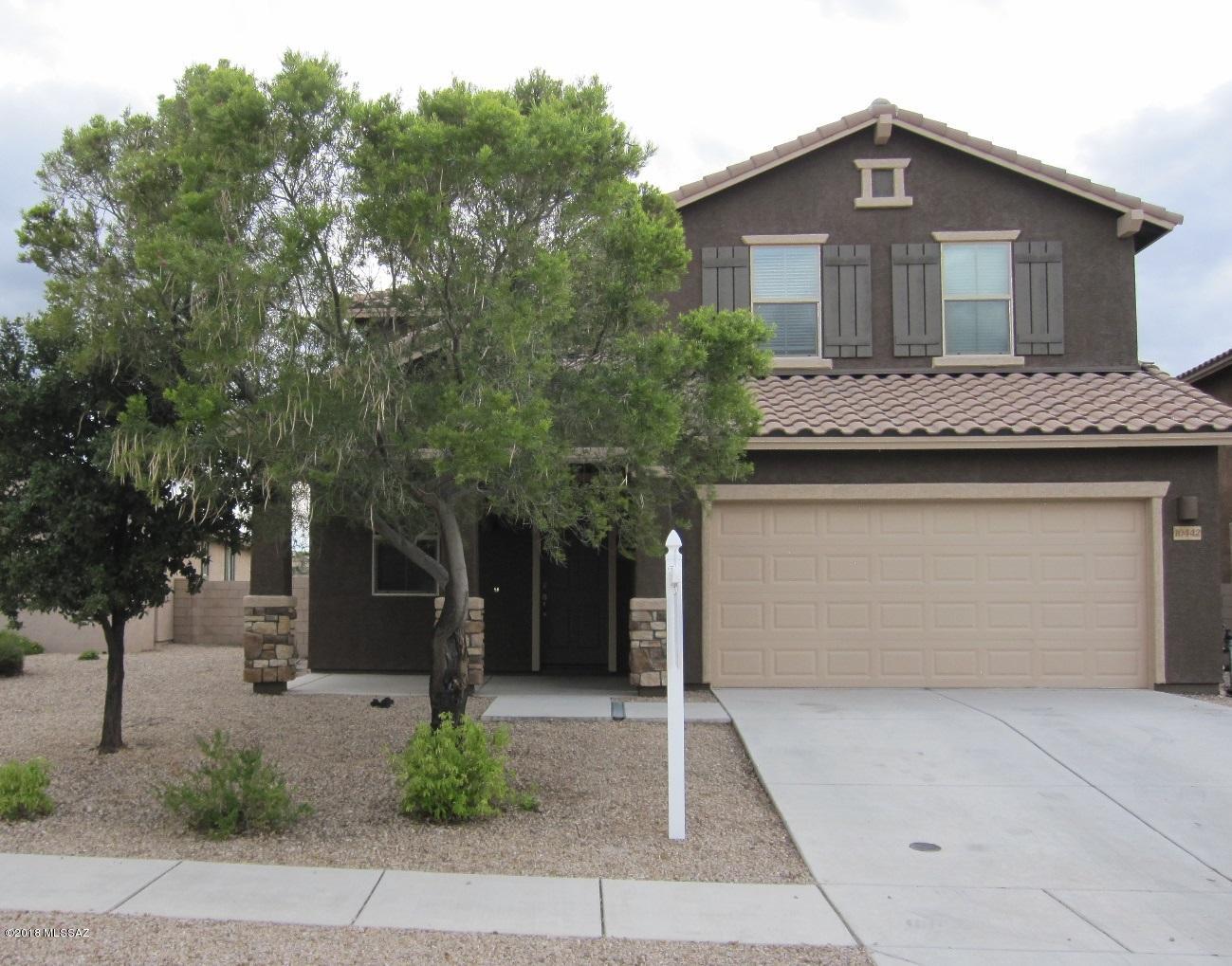New listing in The Bluffs at Rancho Del Lago! Enjoy panoramic views of mountains and sunsets from the covered patio and custom ramada. No neighbor behind you! Two story, 2126 sf, 4 Bedrooms/3 Baths, Living Rm, Family Rm, Breakfast Bar/Island, Laundry Rm (W/D included) and 2-car Garage. Lennar built in 2010. Spacious Master Suite. Granite kitchen incl GE stainless appliances. Large lot backs to common area and the Pantano Wash. Popular neighborhood has a community pool, playground, sidewalks,  jogging path, park (under construction), lake, and more. Close to Del Lago Golf and Ocotillo Ridge Elementary in the award winning Vail School District.  Convenient shopping includes Walgreens and now Safeway! Restaurants and services nearby. Easy access to I-10, Sonoita Hwy 93, and UA Tech Park.