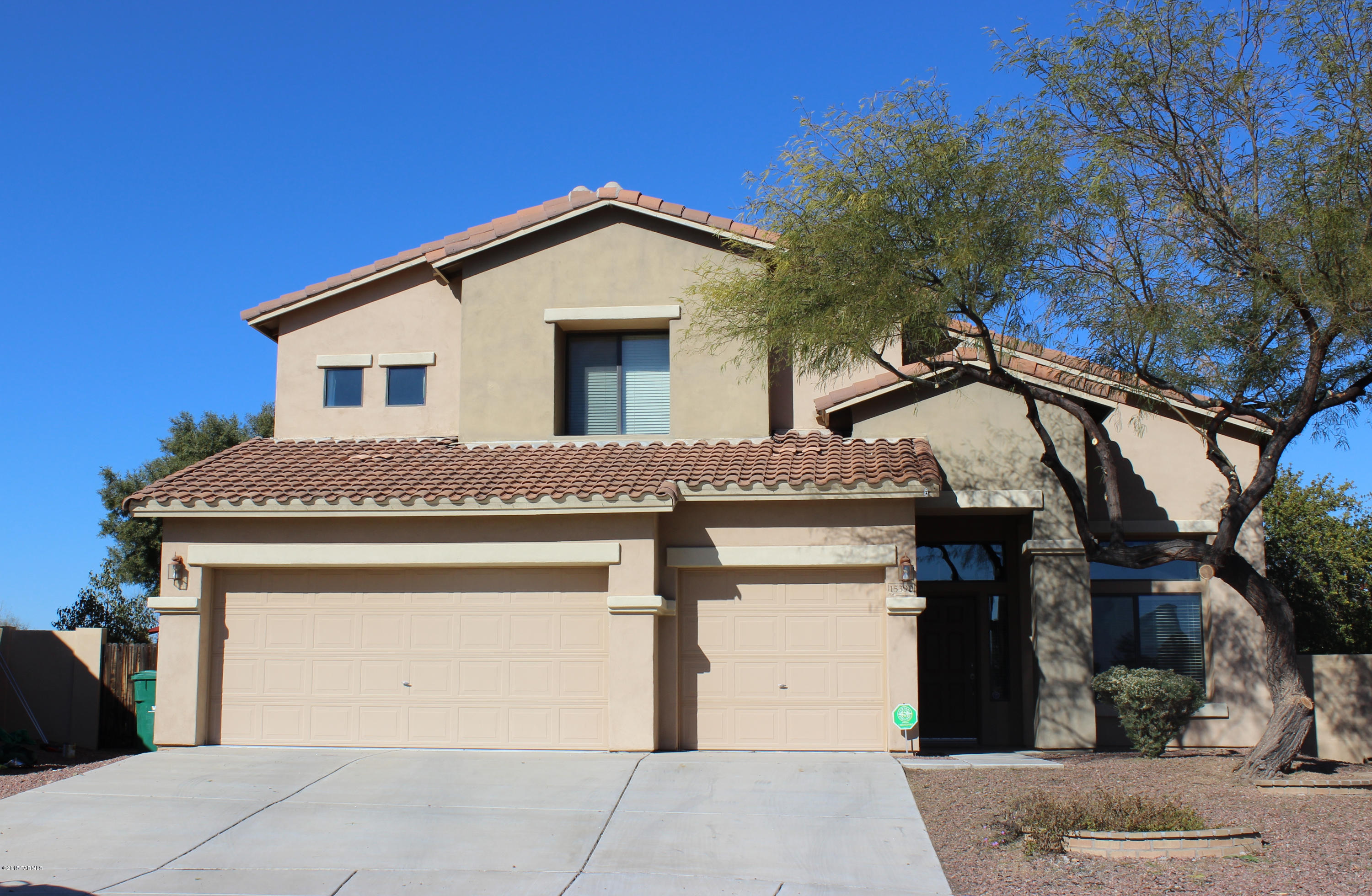 Spacious, well-maintained home w/incredible back yard entertaining space. Cathedral ceilings offer so much space & lots of light pouring in through clerestory windows. Formal living & dining room greet you & then you move further back into the kitchen and family rooms. More soaring ceilings & more light! Kitchen has extended height cabinets & a buffet-style counter top. Master suite is downstairs & opens onto the patio. All other bedrooms are upstairs, along w/a huge loft that can be game room, office, etc. Tons of closet space in this home too! Backyard is an oasis w/ extended patio (w/fans), flagstone, grass yard (on sprinkler system) AND a kid's playset. Did I mention the 3-car garage?! Water softener loop already installed. All within walking distance of De Anza Elementary. Short sale. Don't forget to check out the location of this home in the community.  Near a park and very close to the gym.