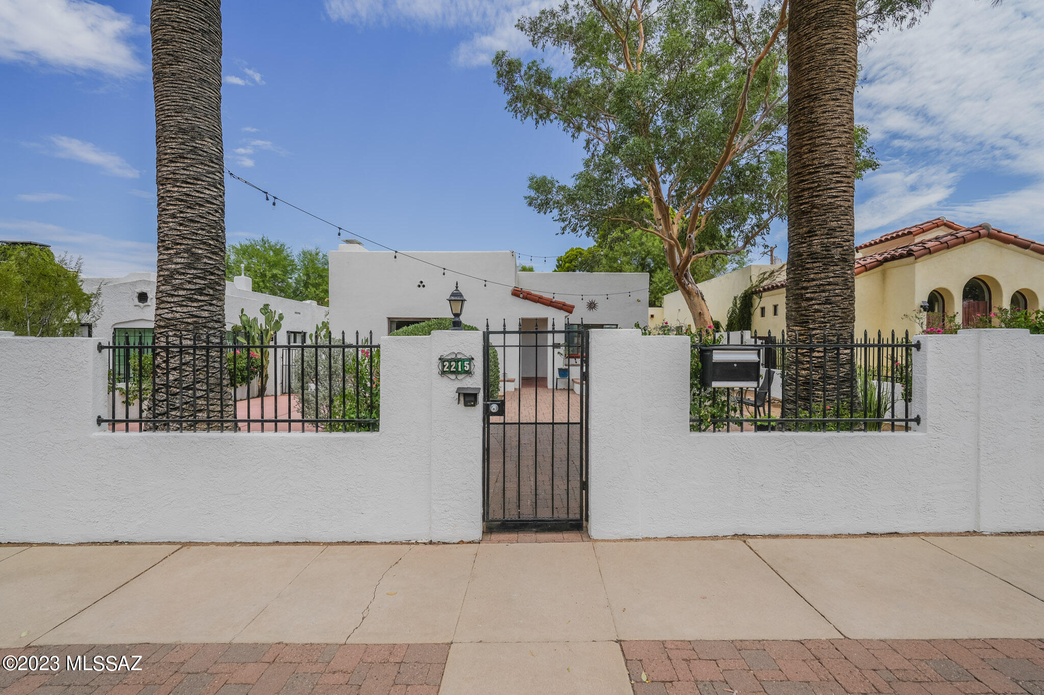 Welcome to this charming home nestled in the desirable Sam Hughes neighborhood. It has formerly been a home included in the Sam Hughes neighborhood tour. This home has a perfect combo of classic historical elements and modern updates. There are unique features that include a large courtyard, original wood floors in the dining and family room area, a basement, and a two-story modern guest house. With its prime location this property presents an excellent opportunity for those seeking easy access to all that Tucson has to offer. There are numerous parks, restaurants, and shopping destinations nearby and within walking distance. You can also take advantage of being in proximity to the University of Arizona. Don't miss the chance to make this Sam Hughes gem your own!