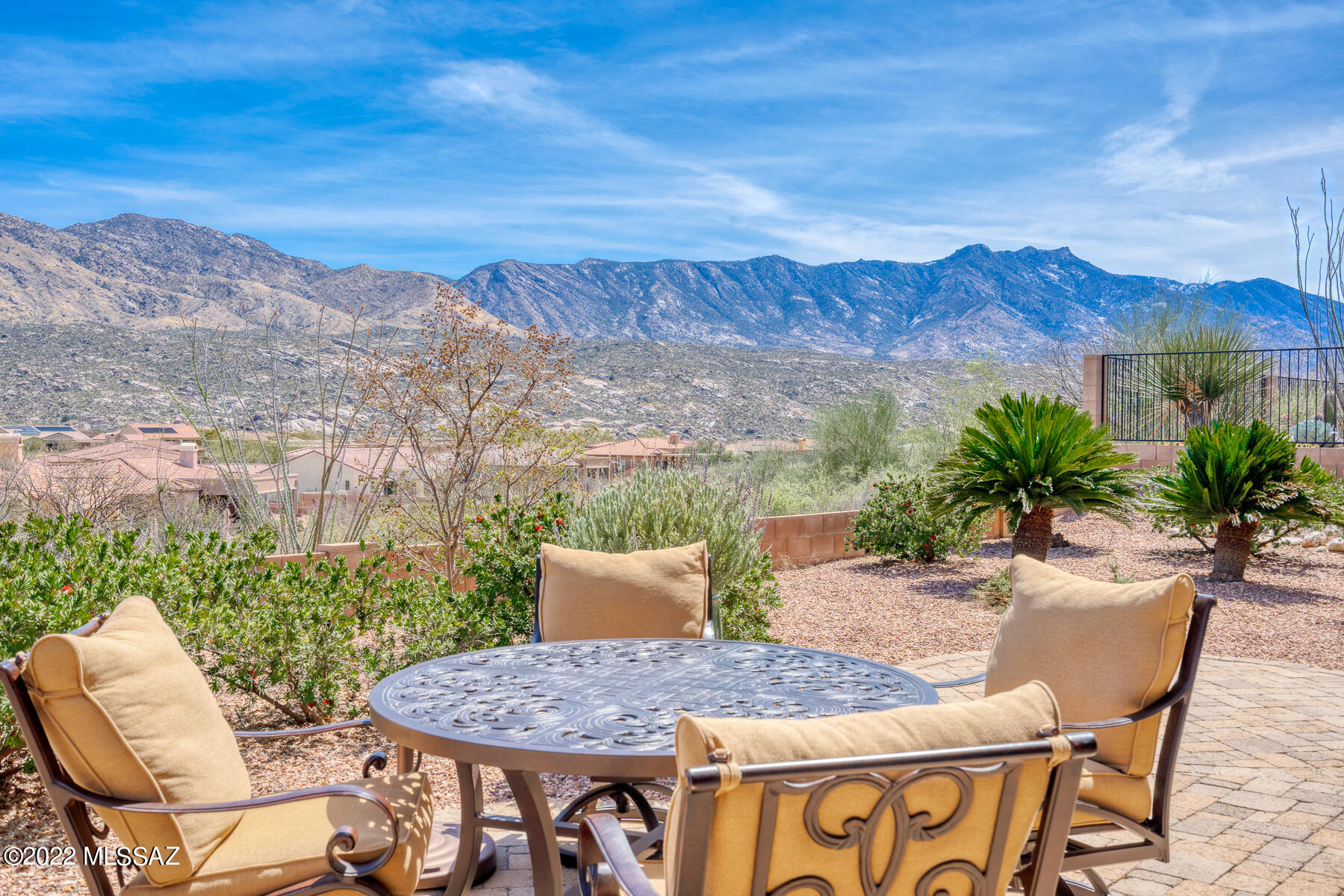 Sited on a spacious corner lot overlooking the Catalina Mountains, this SaddleBrooke Preserve Tierra model is warm & inviting. Upon entering, the mountain views framed by the lush landscaping draw you in. Large great room w wall of windows has wonderful views, a Kiva fireplace & is open to dining. The kitchen has plenty of cabinetry & counter space. Owner's retreat overlooks the views w private den, large en-suite w exercise space, walk thru shower, soaking tub & 2 large closets. Guest wing has 2 bedrooms & bath. A private guest casita, 3 car garage, tile floors thru-out + a soft color pallet highlighting the natural beauty surrounding this special home. The covered patio provides plenty of entertaining space or a private retreat for watching the wildlife & ever changing mountain vistas.