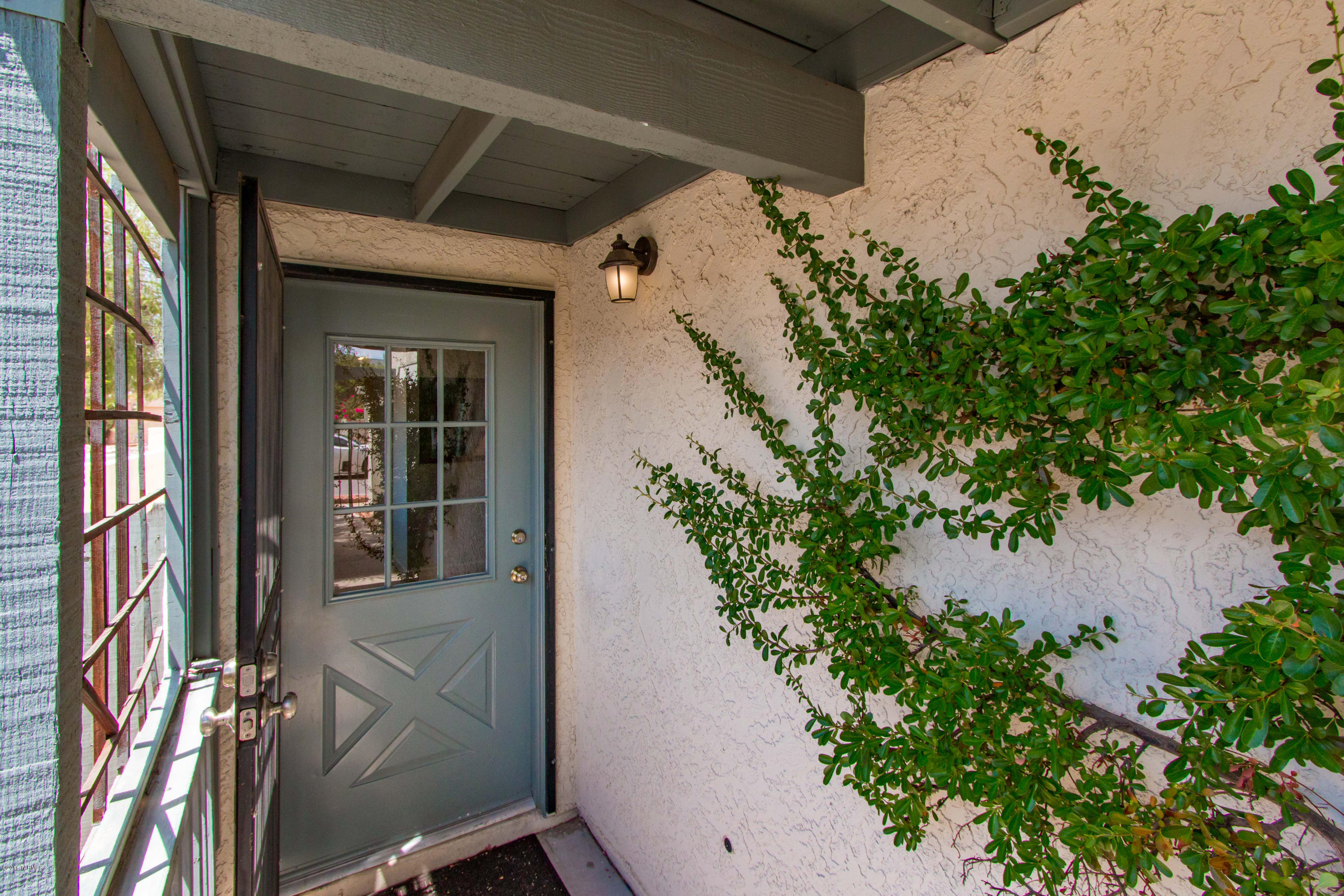 Living is easy in this well-maintained upgraded 2 bedroom 2 bath home. This move-in ready home boasts vaulted ceilings, new interior paint and bamboo flooring throughout except for kitchen and baths. Travertine tile and natural stone finish off the remaining floors. Granite counter tops in bathrooms with new vanities. New stainless steel kitchen appliances, ceiling fans, upgraded light fixtures and faucets. Fireplace in spacious family room. Corner lot and no neighbors behind home for added privacy. Come by today and check out this home.