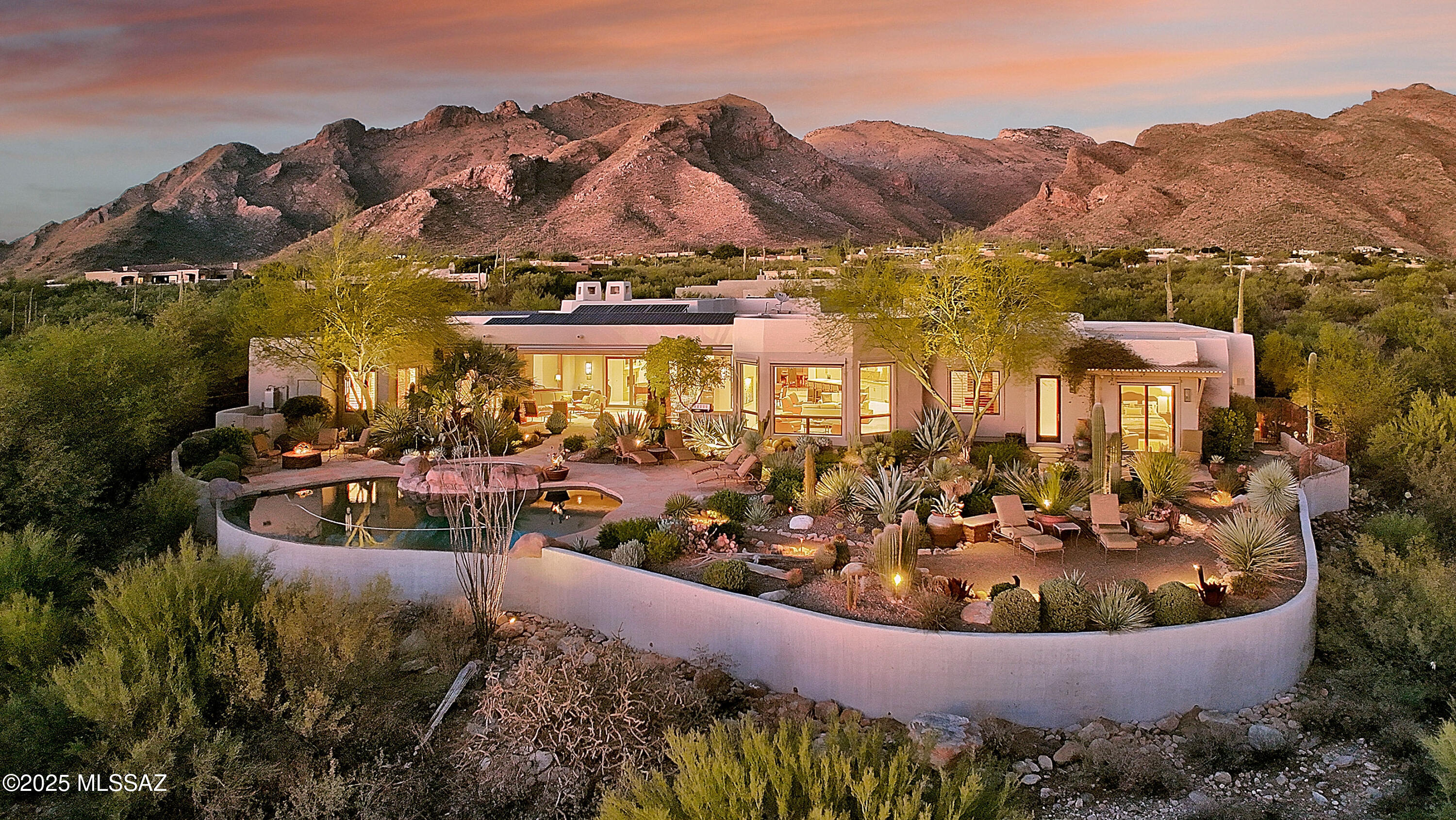 * DESERT SANCUARY*  AMAZING ESTATE CELEBRATES THE SONORAN DESERT - BRINGING TOGETHER THE BEAUTY OF THE  DESERT & TIMELESS ELEGANCE OF SANTA BARBARA DESIGN! TUCKED IN ''GATED'' PIMA CANYON-  EMBRACING THE WONDERS OF THE DESERT... MAJESTIC MTN, SHIMMERING CITYSCAPE & BREATHTAKING DESERT TERRIAN!  GATHERING ROOM- WALLS OF WINDOWS W/CAPTIVATING CITY & HORIZON VIEWS, REMODELED KIT-  STATE OF THE ART APPLIC/ BAR /MEDIA CTR  & ELEGANT STONE FP! FORMAL DINING EMBRACES THE CATALINA MTNS FOR MAGICAL DINNER EXPERIENCE!
BKYD RESORT LIVING- INCREDIBLE LANDSP ...GARDENERS DREAM! FEELS LIKE THE ''DESERT MUSEUM'' UNIQUE CACTI SPECIMENTS, SPARKLING ''SOLAR'' POOL/SPA, PATIOS GALORE, BBQ/AWNINGS-  BRINGS YEAR ROUND ENJOYMENT! FILLED W/JEWELS- GUEST CASITA, ALL EN-SUITE BRS, OWNED SOLAR- ENTIRE HM!