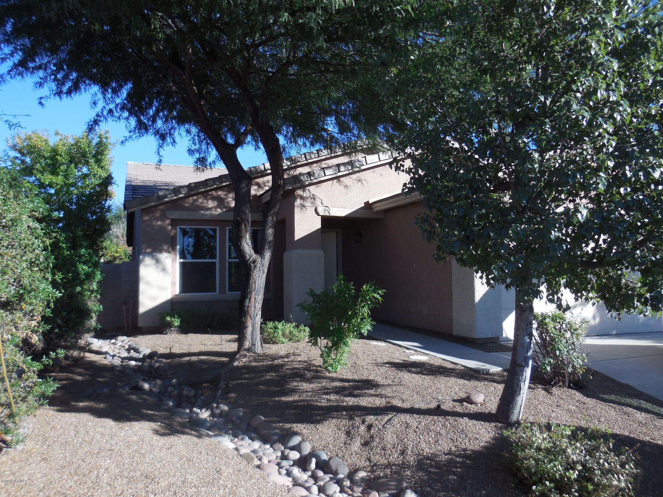 HomePath Property - Love a gracious setting in this 3 bedroom or 2 bedroom and den.  2 car garage, covered patio, nice covered patio, gourmet kitchen with all stainless steel appliances.  It's personality plus and really ultra, ultra pretty like a picture book setting inside and out.   If this meets your needs we recommend quick action!  Close to great amenities such as shopping, Davis Monthan Air Force Base, new shopping center and medical. Special HomePath First Time Homebuyer Program with 3% closing costs available to qualified buyers (see attached flyer for details).