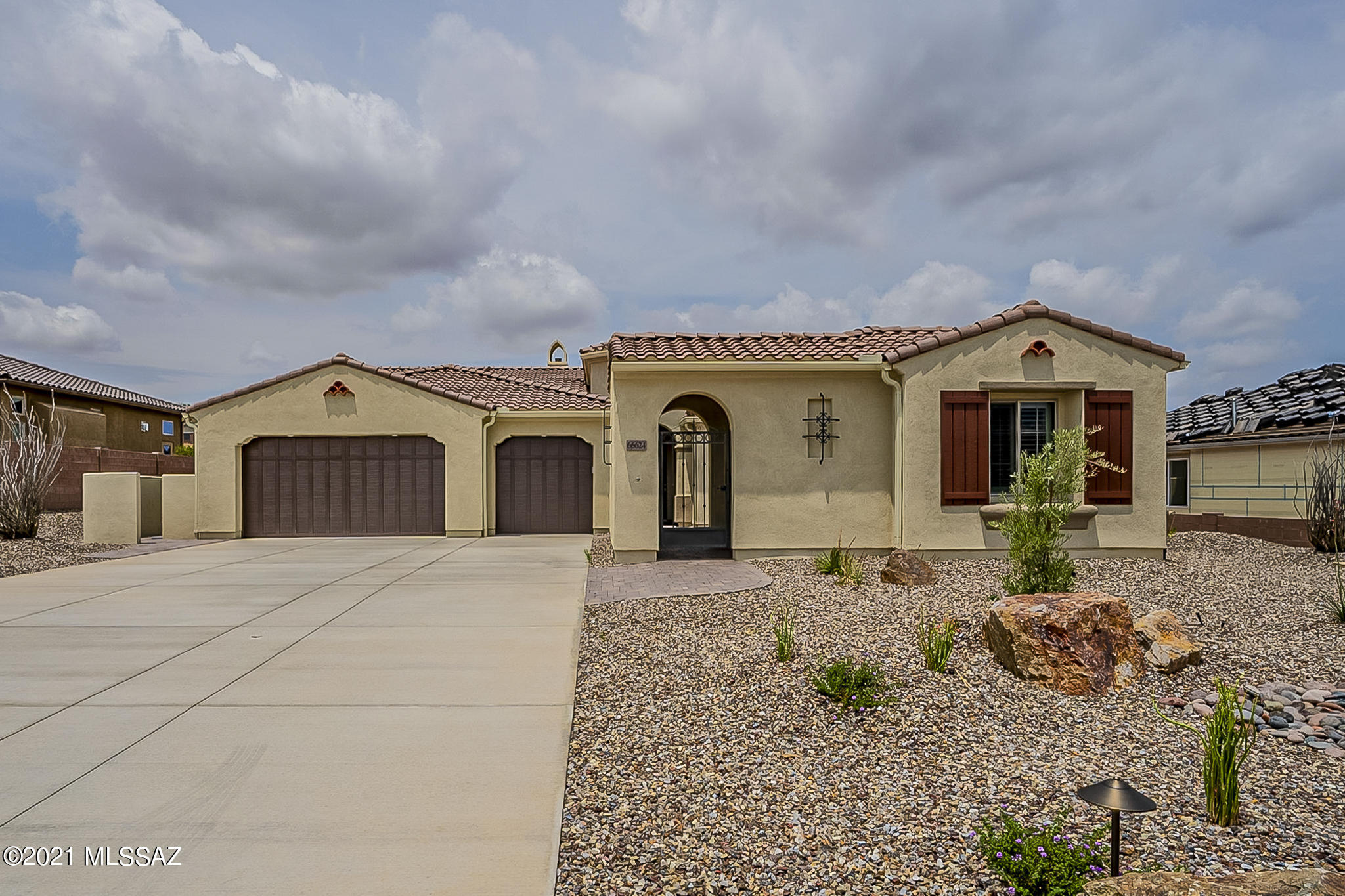 Stunning, better than new home with every imaginable upgrade! Expanded Paloma model with Casita and private courtyard. The gourmet kitchen boasts quartz countertops, Sub Zero fridge, Wolf range/oven and large walk in pantry. Built in dry bar with wine cooler, and remote controlled blinds.  With a fireplace in the great room and one on the back patio, this is a great home for entertaining or enjoying a cozy evening. Relax out in your front courtyard and watch the mountains turn pink or enjoy the Coyote grill in your very private backyard that backs to natural desert with no neighbors directly behind.  Topped off with Pottery Barn furnishings, available on separate bill of sale this is a must see and an opportunity to move right into a ''Model Home''.