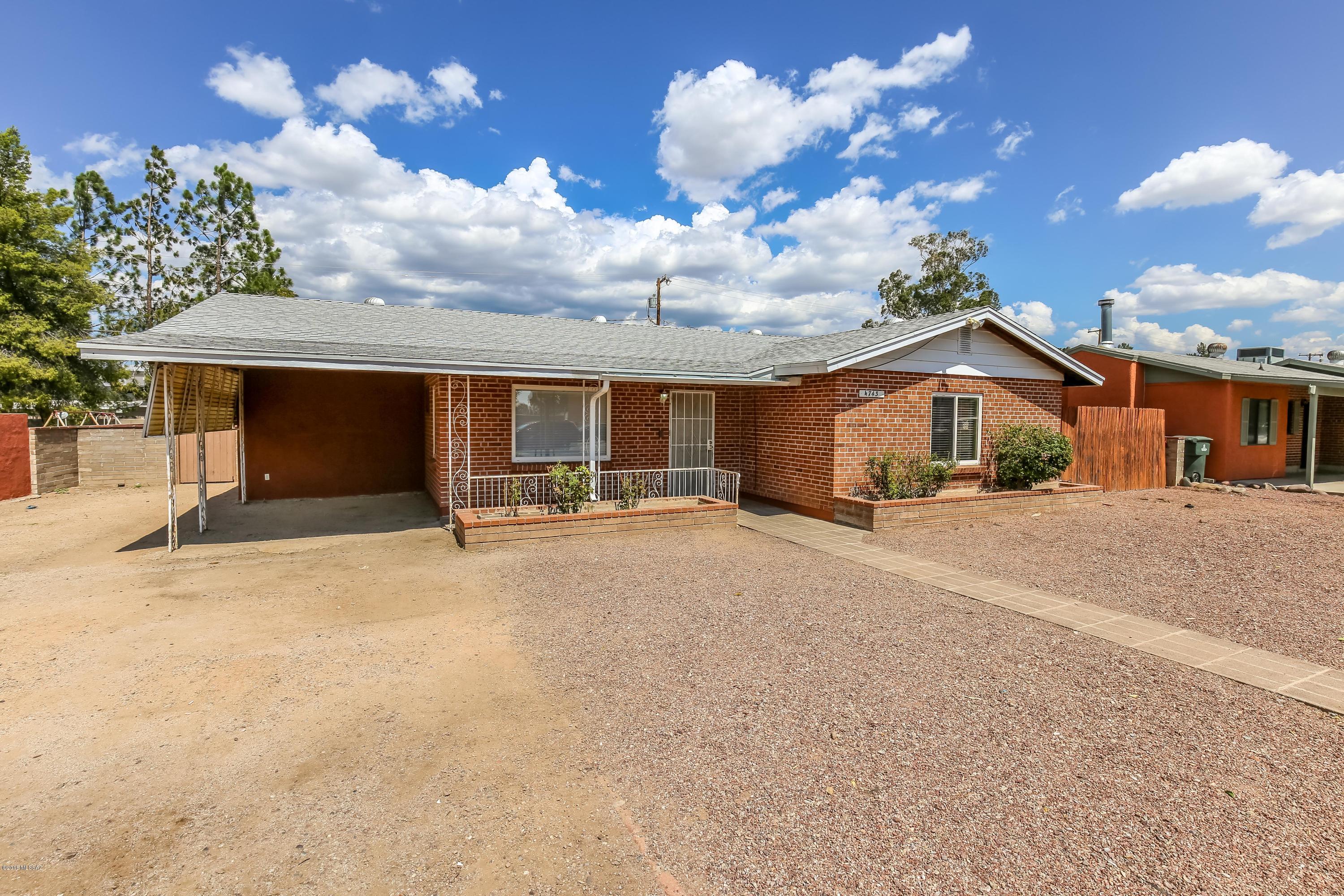 Centrally located spacious 3 Bedroom, 2 bath house with office and a large walled backyard, covered parking carport and plenty of room for boat/RV to park. New energy efficient Central Air/Heat system installed 2018.  Includes Washer/Dryer, Dishwasher, Stove & Fridge. Home has dual pain windows and a Brand new roof.   Call James Gosses at 520-991-7809 to arrange a showing.