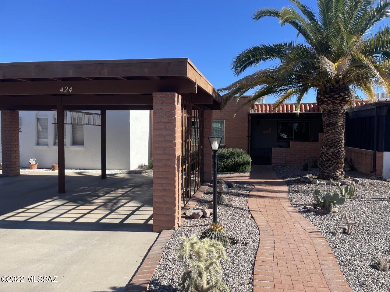 Lovely Casa Paloma 1 Townhome.  New hot water heater.  Patios covered front & back.  Big common area to the rear.