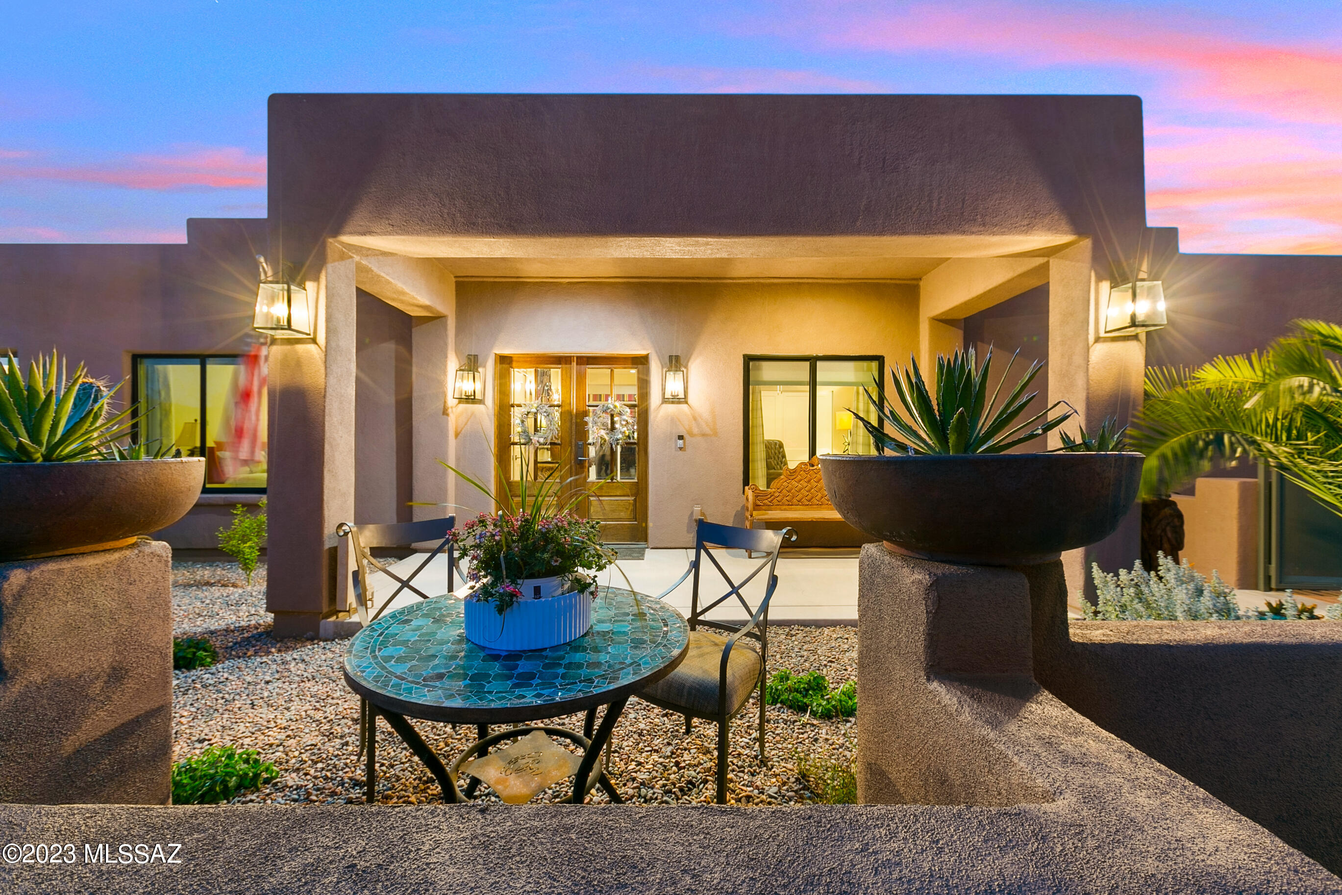 Unobstructed, panoramic Catalina mountain views spanning 270 degrees from this expanded & impeccably renovated Tanque Verde Valley home on a privately tucked away 1.17-acre cul-de-sac lot near schools, parks, restaurants & shopping.  Live free with No HOA & plenty of room for an RV or other toys. All new zoned HVAC. This reimagined, 3 bed + den masonry stucco home is thoughtfully designed for maximum use of space & effortlessly joining indoor & outdoor spaces beginning w/ an inviting courtyard & covered patio for enjoying magical sunrises w/ views to the east. Enter through a custom front door into an impressive hallway w/ travertine floors. Spacious den/office/4th bedroom just off the entry, an unexpected wet bar w/ sink & beverage cooler provides plenty of extra storage for glassware & a nearby powder room for guests.  A stone-faced wood-burning fireplace that anchors a flexible space that currently houses a pool table but could be used in various ways, from a formal dining room to a reading or playroom, and opens up to the bright & open kitchen/family room area that is the heart of this exceptional home. The modern kitchen is finished w/ leathered granite counters on the center island w/ a breakfast bar, stainless steel appliances, a custom backsplash & a full-size pantry. Natural light fills the space from large picture windows that capture the glorious mountain views. The generous space with a dining area & family room w/ a stacked-stone decorative fireplace has sliding glass doors to the covered patio outside. Every inch of this flawless renovation reveals new materials steeped in thoughtful design choices that unify a theme of refined ease.  The sizable master suite w/ acesss to the patio includes a luxury bathroom w/ a separate shower, an elegant soaking tub & dual sink vanity w/ honed travertine counters. The large walk-in closet has custom built-ins. 2 additional guest bedrooms, and a guest bathroom with high-end finishes. A huge fenced backyard w/ artificial turf, pool, spa, gazebo & built-in BBQ is a private sanctuary built for enjoying time w/ family & friends. Perhaps, the extra large laundry room w/ tons of storage cabinets, a sink & a glass door to capture stunning mountain views.  2-car garage located just off the laundry area. There is a large motor court with tons of room for parking.  All new professionally designed low-care landscaping with all new irrigation and four fruit trees. Kitchen has Reverse Osmosis water system. 

Horses: This property is zoned for horses, and there is plenty of room to add horse facilities to fit your individual needs. 

Mt. Lemmon: Convenient location to get to Mt. Lemmon, with a summit elevation of approximately 9000 ft. is the highest point in the Santa Catalina Mountains. It is located in the Coronado National Forest and is an incredible retreat from the hot temperatures in Tucson in the summer. Enjoy skiing, hiking, biking, and rock climbing.  Summerhaven is a small town at the top of the mountain with quaint restaurants and seasonal events. It is reported that Mount Lemmon Ski Valley, on the mountain's northeastern side, receives 200 inches of snow annually.  

Golf: 
The 49ers Country Club is a semi-private golf club located in the Tanque Verde Valley.
Spread over 110 acres, the course is known for its lush, mature landscaping and excellent course conditioning. It is lined with mature stands of mesquite, giant cottonwood, Eucalyptus, and weeping willow trees.  Members enjoy a 6,681-yard, 18-hole, par 72 golf course. The winding fairways and majestic mountain views surprise golfers at every turn. The Rincon Mountain Grill is a full-service restaurant open to the public. Forty Niners CC has a swim team for the kids, summer camps, and several events throughout the year. The workout facility is fully equipped, with 24-hour access and many fitness classes.

Arizona National Golf Club, designed by Robert Trent Jones Jr, is nestled in the foothills of the beautiful Santa Catalina Mountains and abutting the Coronado National Forest. Arizona National follows the rugged natural flow of the land across shady mesquite-lined arroyos and skirts with craggy rock outcroppings.


Parks:
McDonald Park offers an off-leash dog park that includes a separate area for small dogs, drinking water, shade trees, and picnic tables. In addition, the park also features a playground, horseshoe pits, basketball and volleyball courts, softball, baseball, and soccer fields, walking paths, and restrooms.

Agua Caliente Park is tucked away in a quiet, residential area. This unique 101-acre park features a perennial warm spring and three ponds, which are home to a rich mix of plants and animals.