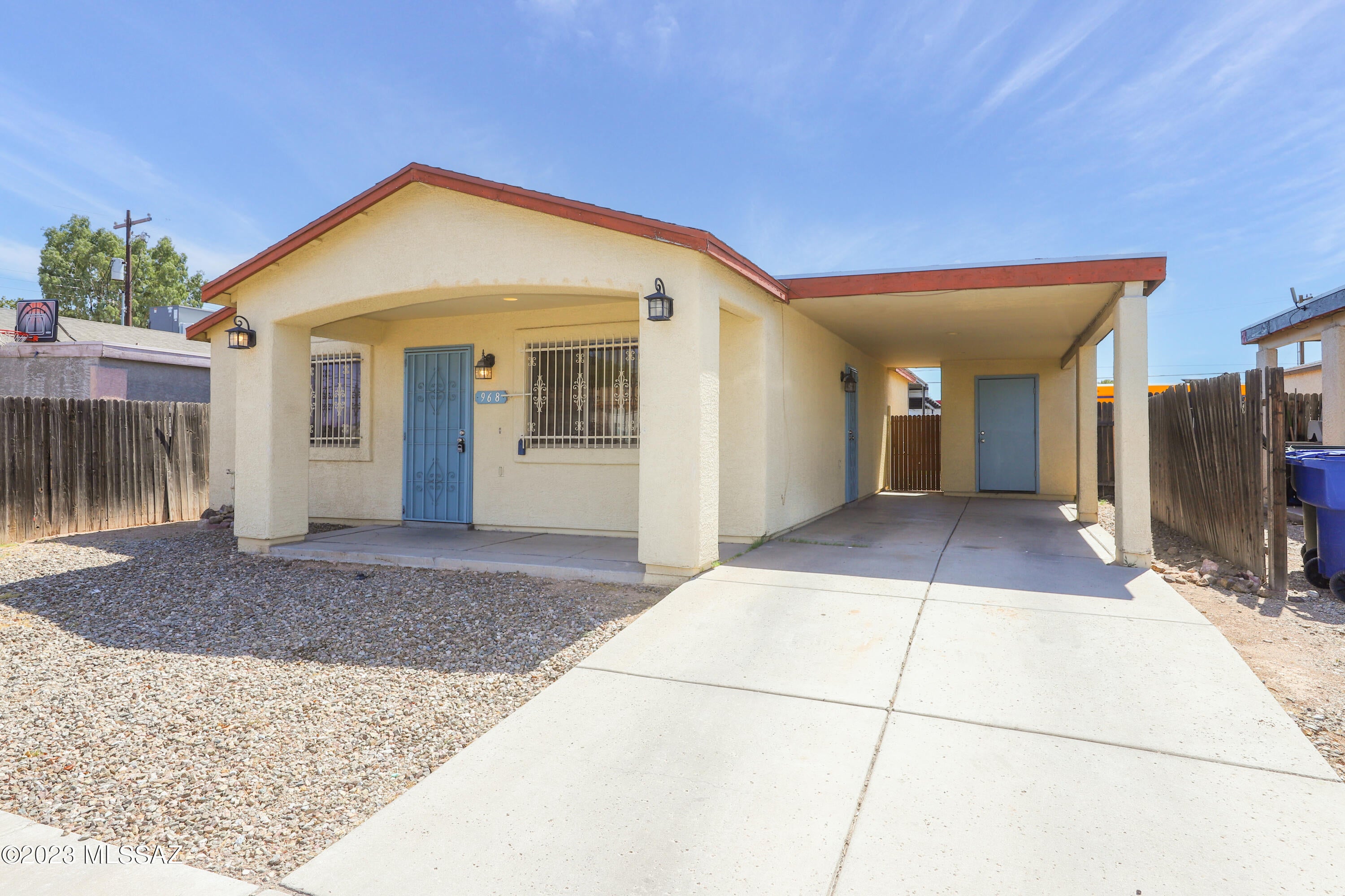 This beautifully maintained move in ready home offers; carport (2 car tandem)with storage, on street parking, no HOA, no carpet...all floors are wood laminate or tile, nicely appointed kitchen with newer black appliances including a french door fridge, laundry closet with storage shelves, sliding glass door from master bedroom to private backyard that has artificial turf and decorative gravel.  Location is convenient to several restaurants, major employers, I-10, and minutes from downtown.