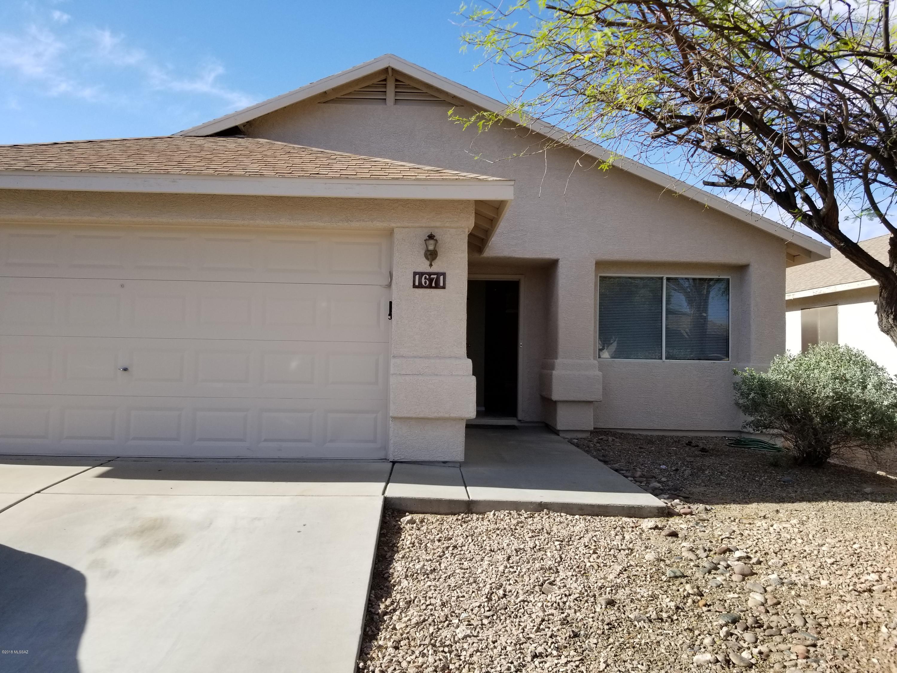 Renovated move in ready 1500sqft home
Cheerful & bright contemporary home centrally located with 3 bedrooms, 2 living rm, 2 bath, 2 car garage.
Large Master bedroom with walk-in closet

UPDATED/Replaced -
Bathroooms with new Sinks and Faucets 
Newly painted Exterior, fascia repaired/replaced
Newly painted Interior

Garage refinished with Epoxy flooring
3 Bedrooms with new carpet
New Kitchen faucet and Electric Range

Kitchen, bathrooms and laundry tiled 2 yrs ago
Large living rooms with wood floor
Appliances Washer, Dryer, Dishwasher, New Electric Range, AC compressor

Central location, mins from UofA, UPH, Banner UMC, Downtown, Kino Stadium 
Easy access to I10, DMAFB, 1 mile from Costco, Walmart in Tucson Marketplace
Opp Quincie Douglas Library & Rec Center featuring po