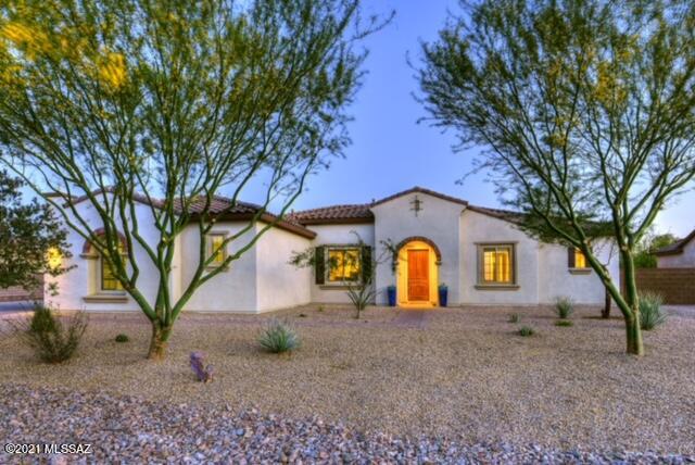 The best description of this home is it ''lives well''.  From the moment you enter the gates of this wonderful neighborhood you get the feeling that this is a great place to be. Light filled spaces at every turn,  glass doors from a myriad of rooms leading to outdoor living, and an airy ambiance throughout.  Split plan with a multi purpose room just perfect for play, media, or of course a 4th bedroom.  The home was designed with an eye for wonderful custom soothing colors accented with crisp white woodwork.  The outdoor living is close to perfect.  All the boxes are checked as to why we live in Tucson.  Quite honestly...this one you just have to see.