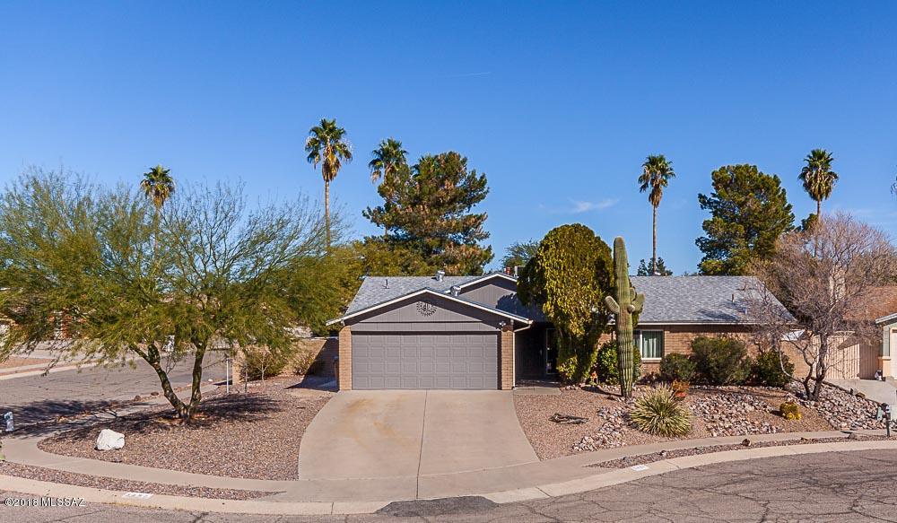 Extremely well maintained home with large corner lot appeal on a cul-de-sac. Recent updated kitchen with
custom cabinets and Corian counter tops and backsplash. Enjoy cooking on a gas stove! Stainless Steel refrigerator is included. Recently
updated bathrooms. Beautiful large yard with pool and covered patio that runs the length of the house, perfect for entertaining friends and
family. Energy efficient windows will help save on your electric bill. This home has many more pluses to mention here but come see it
soon and see for yourself!