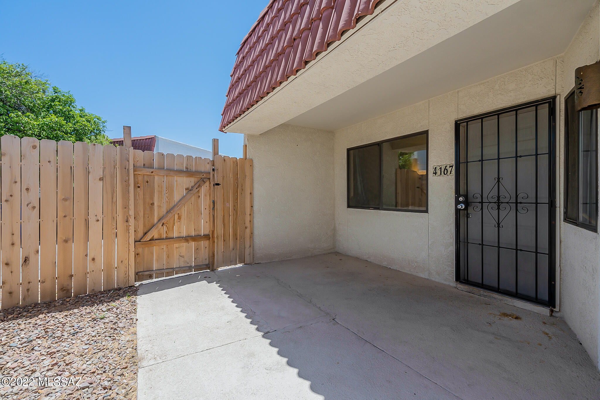 Move-in ready remodeled 2 bed, 2 bath home in a great Central location. Standalone townhome with no shared walls. New tile floors throughout, washer/dryer, remodeled vanities and tiled showers in both bathrooms and more! Beautiful new quartz kitchen counters with mosaic backsplash plus stove, refrigerator, and dishwasher. Featuring a spacious master bedroom & en suite bath. Both bedrooms have sliding doors that open to the patio with its own hot tub! It's also got multiple patio/yard spaces and a private carport(#13) with storage closet. Tenant vacates in June. Closing of 6/30/22 or after is acceptable to seller. This one won't last. Please submit offers by 5/29/2022. Initial offers will be responded to on 5/30/22 by 2:00PM. Seller reserves the right to entertain offers prior to this da