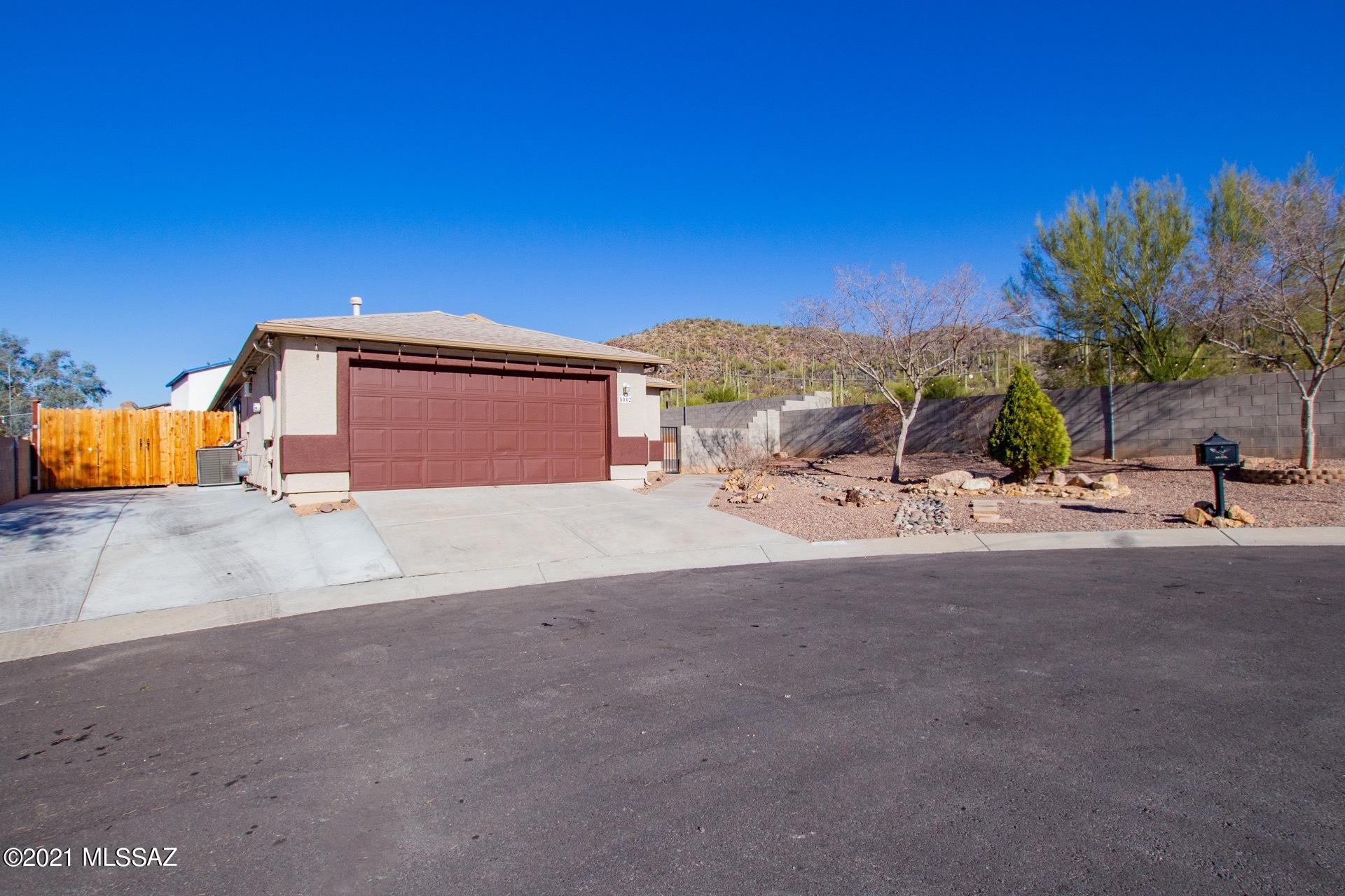 Range priced $215,000 - $235,000. Move-in ready home situated on a cul-de-sac lot w/breathtaking Mountain views!  RV Gate & Parking.  Exquisite interior w/handsome engineered wood floors throughout,  soothing palette, upgraded lighting, recessed lighting, window blinds, & a formal dining room. Beautiful eat-in kitchen w/patio access, stylish counters, SS appliances, & a double sink.   Pristine baths, interior laundry room w/storage cabinets, ceiling fans, & plush carpet in 2 bedrooms. Master bedroom boasts a private en suite w/dual sinks. Enjoy the backyard fire pit, covered patio,  & vast views. The wonderful home will go fast! Take a tour today.