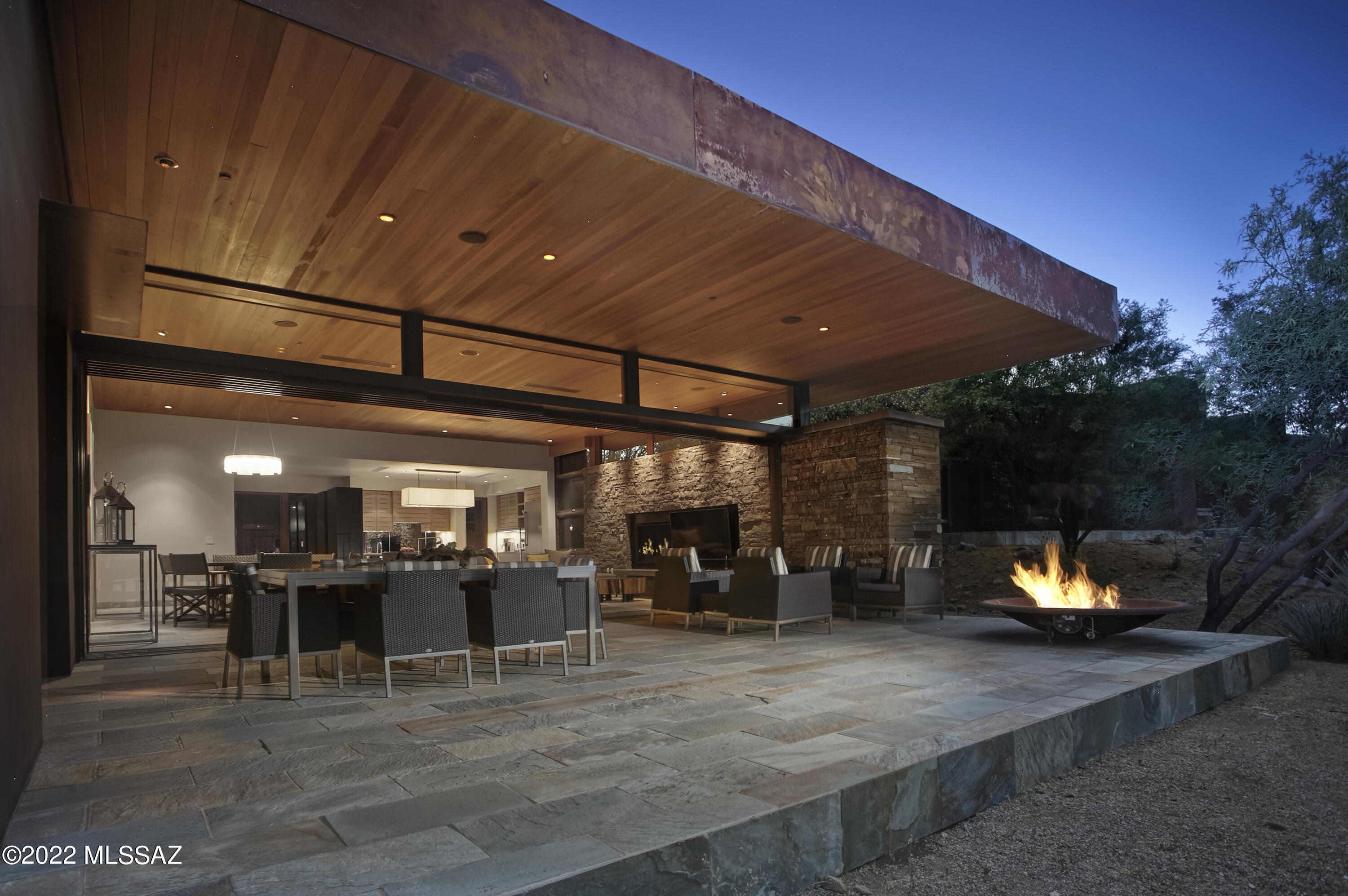 The Villas at MIRAVAL Resort offer what no other residence can -- one of the world's most acclaimed wellness destinations, at your doorstep.  

Integrating materials, textures and colors that speak to the surroundings, this Silver LEED residence evokes a sense of calm and tranquility.  The minds behind the architecture at MITHUN intentionally created a dwelling that sits subtly amidst the desert, while offering a powerful experience upon entering. Seamlessly blending indoors and outdoors, with unobstructed views of the Santa Catalina Mountains, the space invites you to relax, breathe and connect with nature. Wood, glass, stacked stone, concrete, and quartzite layer texture throughout the space, enhanced by thoughtful lighting. Separated by a peaceful courtyard, this home features a main house with the primary suite and living areas, and a separate casita with an additional bedroom and den. Natural open desert behind the eastern facing expansive patio allows for privacy and quiet. Beautiful sunrises illuminate the home at daybreak, while dark skies allow for stargazing following sunset.

Steps away, owners and guests enjoy the vast array of experiences and amenities at MIRAVAL Arizona. Here you may fill the day with anything from spa treatments, hiking & biking, fitness classes, yoga & meditation, nutrition, lectures, equine therapy, eastern modalities, cooking classes, gourmet meals and many other offerings. Learn more at www.miravalarizona.com

With on-site property management, this residence makes an excellent vacation home. Services available include ground transportation, housekeeping, pre-arrival grocery shopping, and stay planning. The villas concierge is available to assist owners and their guests when in-residence. A resort managed rental program is available for this property, if desired.

A small enclave of homes, Villa 9 is one of only 16 private residences at Miraval Arizona.