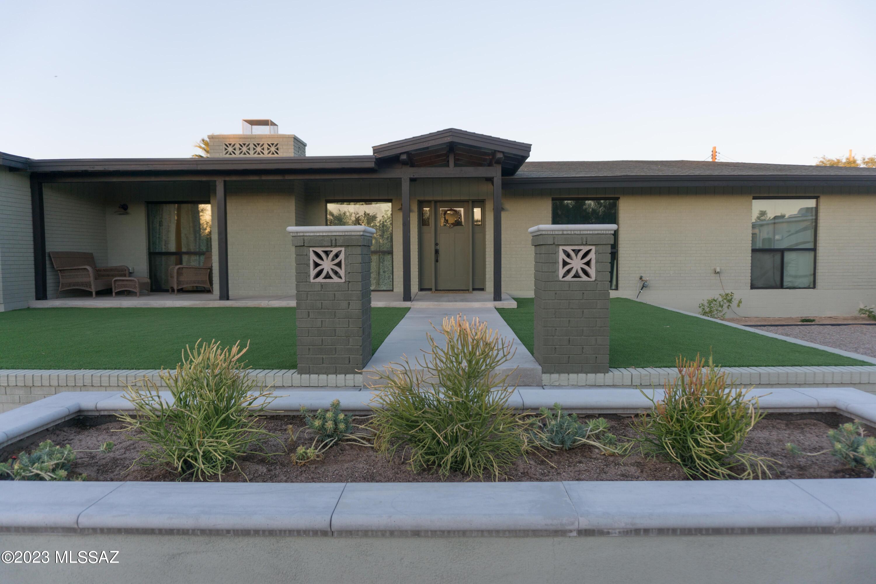 Beautifully remodeled Casas Adobes home,  Four bedrooms, three full bathrooms, ceiling fans thru-out, fireplace, marble counter tops in 
kitchen and bathrooms, conventional pool, great room and dining area off kitchen, large laundry/crafts room with sink,
Newer washer and dryer. Owners Suite features dual vanities, a large walk-in closet, walk-in shower and separate soaking tub. 
Eat in kitchen with a very large breakfast Island, pantry,  Built-in Viking refrigerator/freezer, Decor oven/range w/exhaust hood,
 microwave and Bosch Dish washer. Large great room with fireplace (burns wood or gas).
 Covered Back patio and walled pool area have views of sunrise/Catalina Mountains, catch the
 sunsets off the covered front porch. .
Solar system is owned by seller