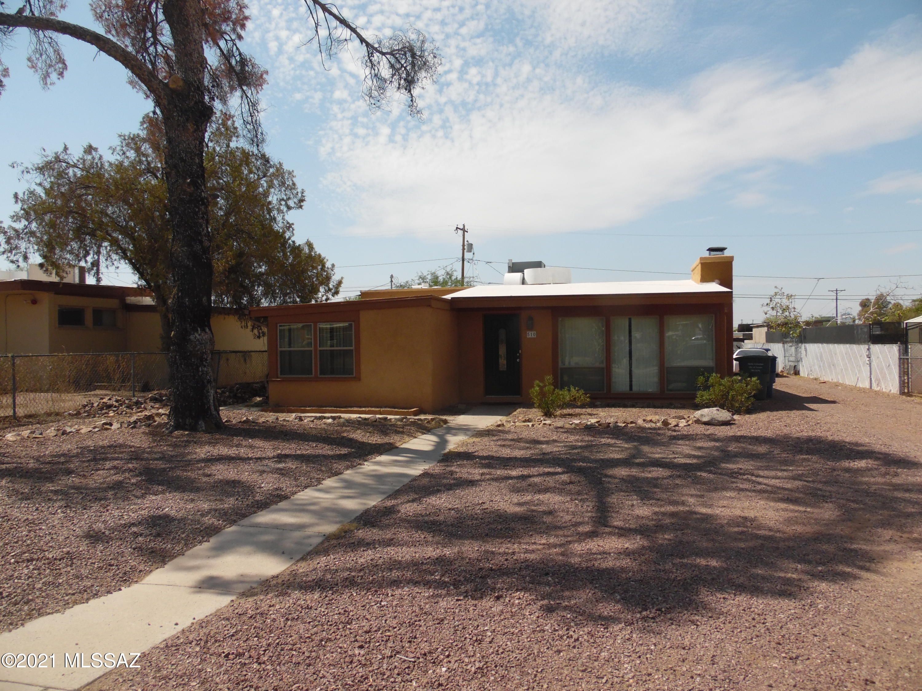 Fantastic 4 bedroom home close to the University. Home is all tile, has a great fireplace and includes washer and dryer. Home has AC and all appliances.  Home is close to downtown, 4th avenue, shopping, restaurants and of course the U of A.  Call today