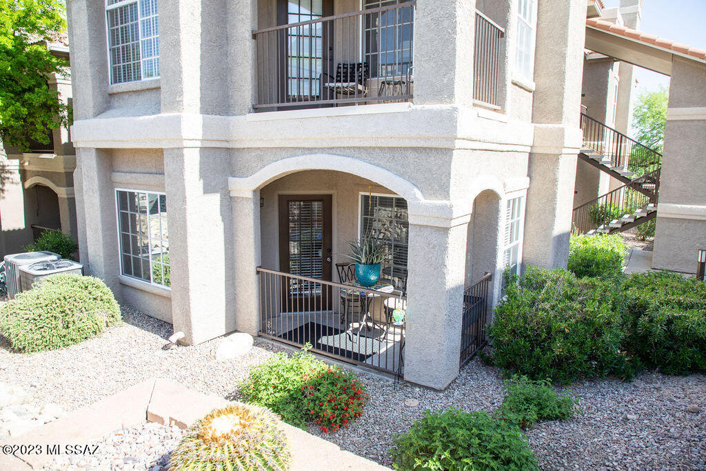 Enjoy resort like living in this immaculate ground floor, corner unit with laminate wood flooring in the main living area and carpet in the bedrooms.  The spacious kitchen has lots of work area and stainless steel appliances. There are two large bedrooms with very roomy walk in closets. The AC, Washer/Dryer and Hot Water heater are all less than 4 years old and the rooms have all been newly painted. The clubhouse, pool, spa, and gym are a short walk across the parking area.  Love hiking?  Catalina State Park is just down the road and the Huckleberry Loop is close by for walking/biking.  The Oro Valley Marketplace, hospital, shops and restaurants are all just minutes away.