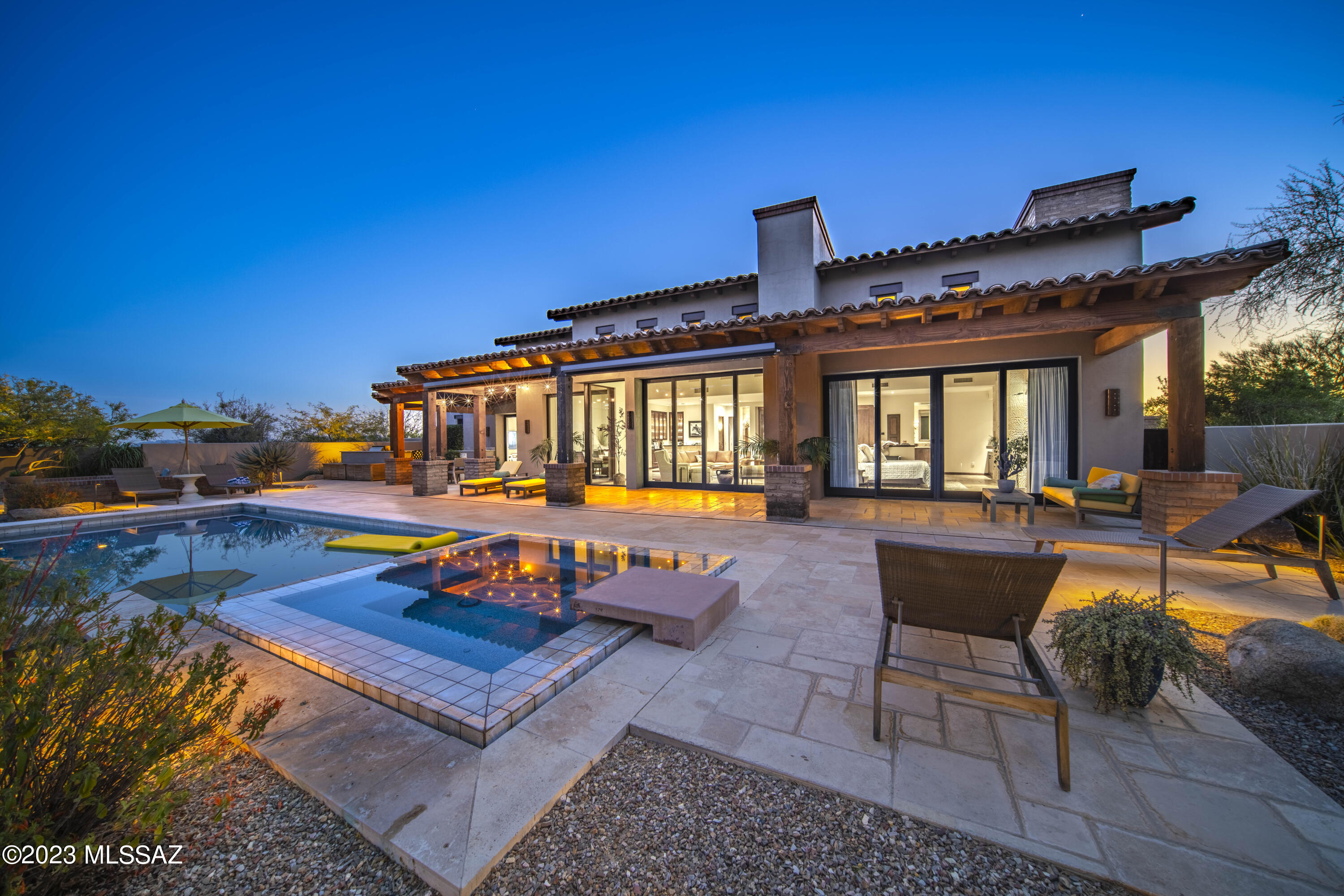 Canyon Pass Perfection! Absolutely stunning Arizona Ranch home situated on a completely private homesite with unmatched Mountain Views! This former Ritz-Carlton Model Home has exquisite detail and has been thoughtfully updated with timeless design choices. The Main House offers a stunning entry with a disappearing window wall that shows off the outdoor entertaining area, including a gorgeous pool & spa, extensive outdoor kitchen & multiple extended patio spaces. All bedrooms feature luxurious en-suite baths. The Guest House offers a bedroom space, sitting area & full bath. The Gourmet Kitchen boasts Viking appliances & opens up to the Family Room- this home truly has it all. Quality, timeless finishes throughout on a phenomenal homesite- this one is truly special. A MUST SEE!