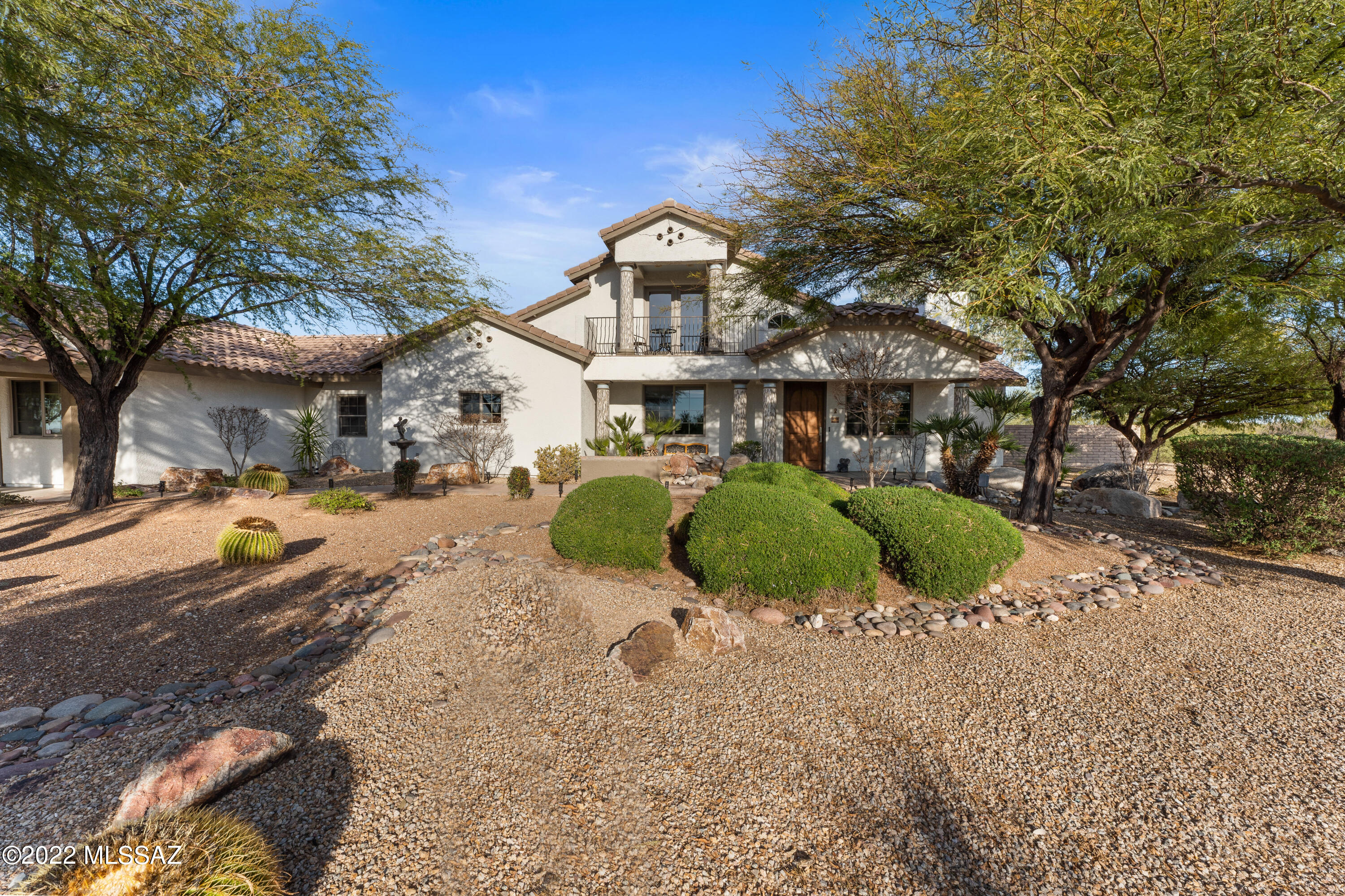 $60K BELOW 11/28/22 APPRAISAL*  Previous Model Home!  SPECTACULAR PANORAMIC VIEWS of the Rincons, Santa Ritas & Catalinas! 1+ acre homesite! DOWNSTAIRS OWNER'S SUITE! 40' negative edge pool & spa, Outside Fireplace/banco seating, BBQ, GOURMET KITCHEN with SUBZERO & WOLF Appliances, Travertine floors, Heated & cooled garage with storage rooms AND workshop. large loft/bonus area/media room with a Wetbar. ENSUITE WITH BALCONY, So many upgrades!  BONUS FEATURES: VIEW FENCING, Extensive Tile surrounds, Custom closet, Solid wood trimmed windows & doors. True Luxury and well maintained! Hiking, biking, 4-wheeling at your doorsteps! OH!....and the wineries are just minutes away! Too many upgrades - see attached flyer and floorplan.