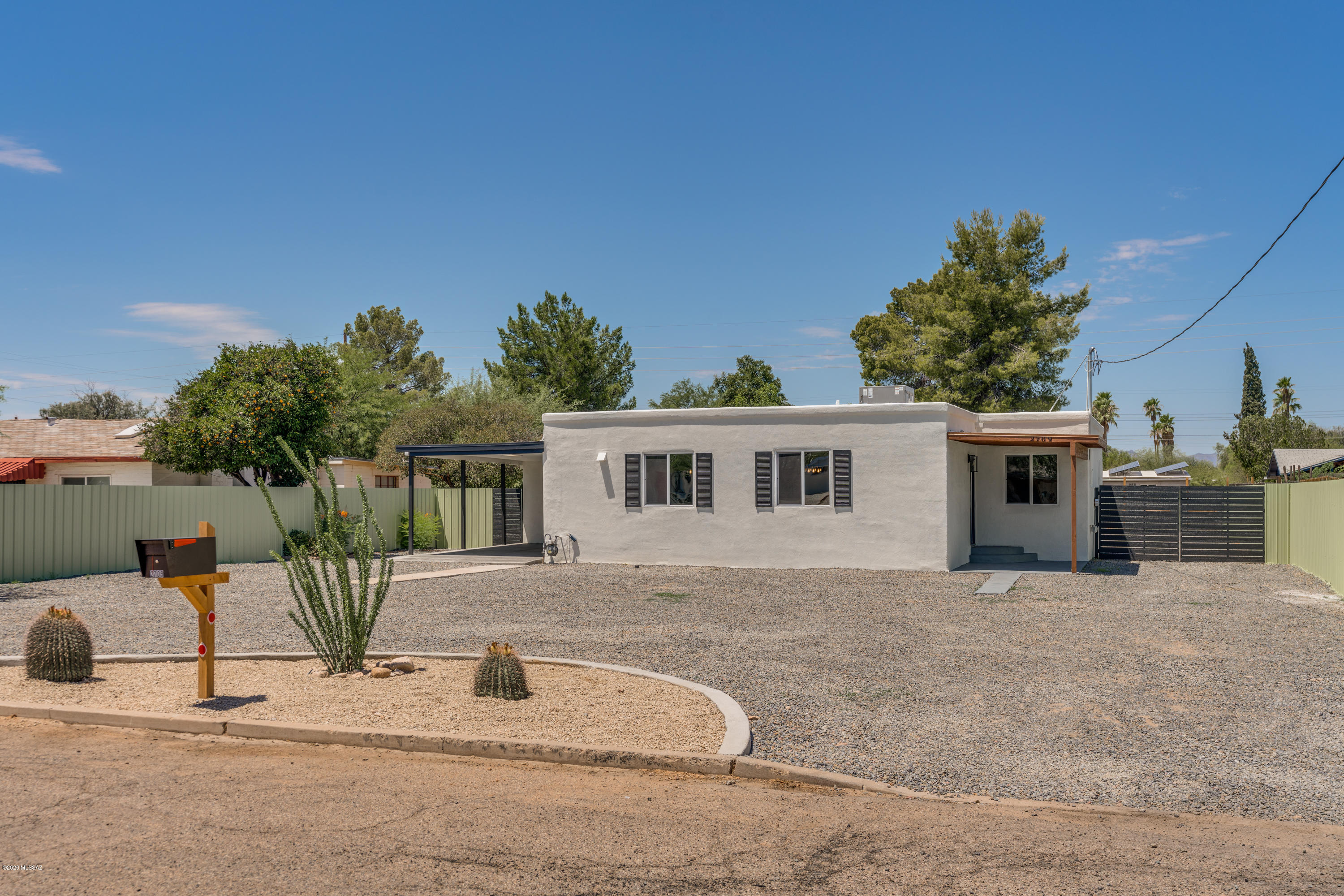 BEAUTIFUL COMPLETELY REMODELED HOME NEAR END OF CUL-DE-SAC MOVE-IN READY!! This 3 bedroom 2 bath home with a 1304 sqft of living space is very roomy with a bright open floorplan. Located in a very popular area of Central Tucson & won't last long. NEW UPGRADES INCLUDE: Exterior/Interior paint, Main entry covered patio, ROOF, A/C, water heater, all electrical including panel, dual pane windows, plumbing, foundation, Granite Kitchen counters & breakfast bar, Crown molding cabinets, stainless steel appliances, large walk-in laundry room, modern light fixtures in all rooms including recessed lighting & ceiling fans, tiled floors through out, tile and glass design in bathroom showers, covered carport at south of the home. HUGE back yard with covered patio, spacious storage room, workshop & surrounded by a modern & tasteful steel laminate fence front & back. A MUST SEE TO APPRECIATE! Buyer to verify all.
