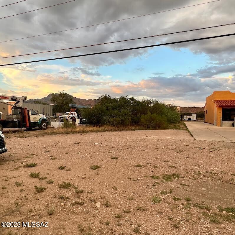 Ready to build Commercial lot! This property could be used for industrial, storage, retail, parking or restaurant located on the frontage road right next to the Rio Rico exit priced to sell. Utilities on the lot line buyer to verify. **Note Santa Cruz County will not update the mapping, subject parcel is lot north of the gun store.