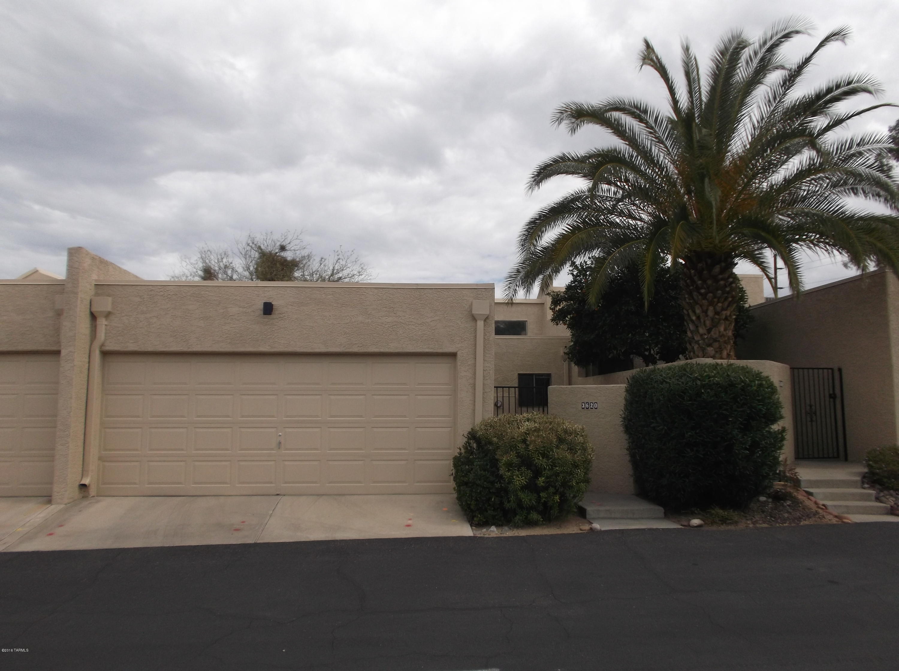 Darling 2BR/2BA townhome in central Tucson. Comes with 2 car garage, private courtyard entry and covered back patio that can be accessed from the master bedroom and living room. Wood ceilings with beautiful exposed beams, saltillo tile floors, carpet in bedrooms with open bright floorplan. Call today!!