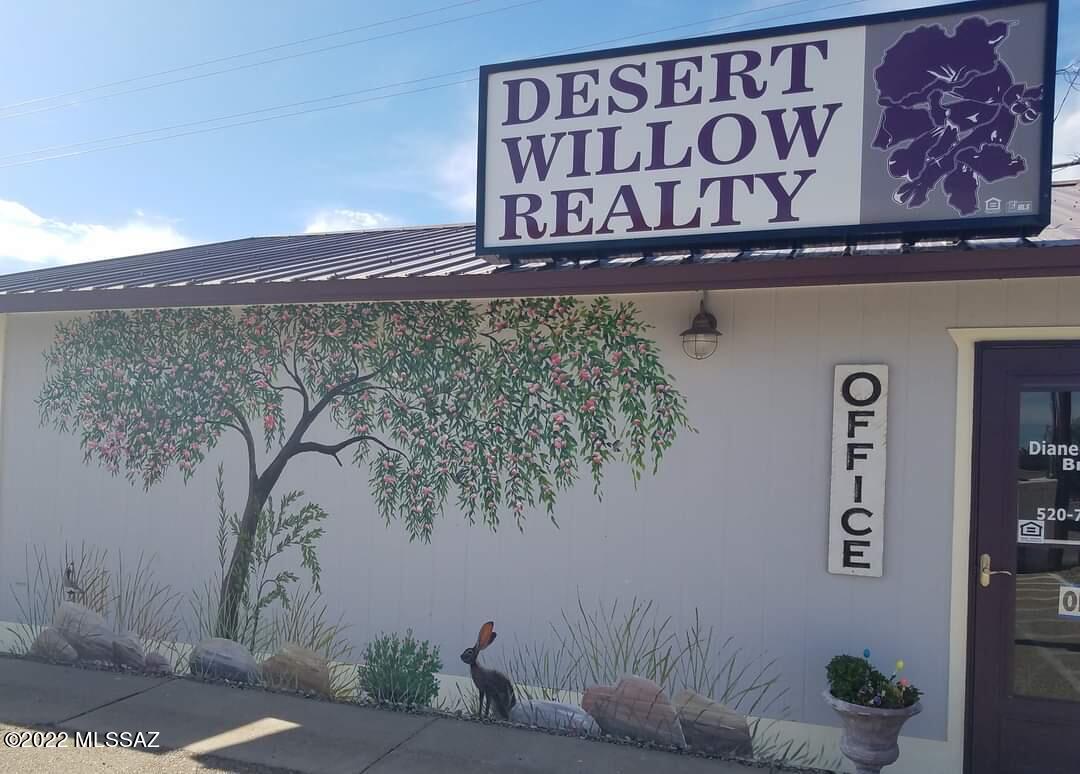 Recently updated Commercial Office Space just off of 4th Street in Benson. New Metal Roof installed 2018. Large office space with a private office ,kitchenette and handicap accessible bathroom. Passcode protected door leads into spacious conference room. Ceramic and hardwood flooring. All Building are heated and cooled with updated Mini Split units. 5 Paved and marked parking spaces and metal storage shed.  Covered Patio and side walk. Beautiful Doug Quarrels mural on main office building follows Benson's mural trend. This building has many possibilities! Currently have a month to month tenant that brings in income.  SELLER IS A LICENSED REAL ESTATE BROKER