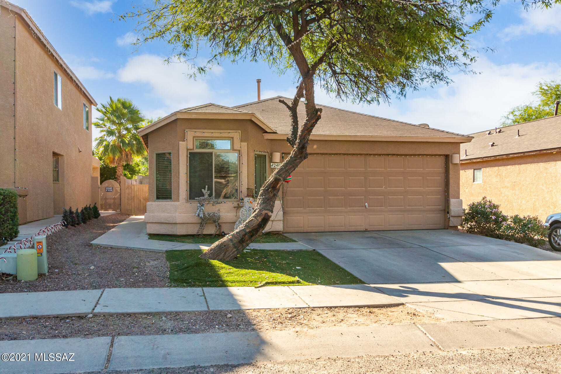 Look no further! This gorgeous single-story home is the one. This property features 2-car garage and a custom wrought-iron front door. Enter to discover the pleasing interior w/an open floor plan boasting neutral tile floors, vaulted ceiling, soothing palette, and abundant natural light. The fully equipped kitchen offers ample cabinets w/crown moulding, track lights, and center island w/breakfast bar. Primary bedroom showcases a lavish bathroom w/dual sinks. Spacious backyard w/pavers is an open canvass for your future desert oasis! What are you waiting for? Book an appointment today!