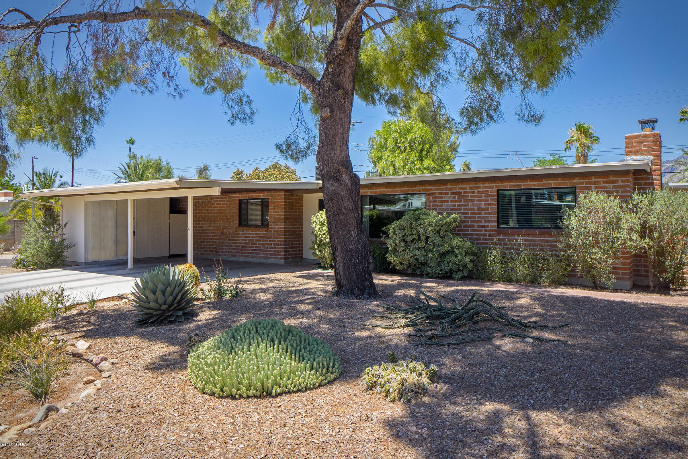 Neat and tidy mid-century brick home with great pride of ownership. Lovingly cared for. Glenn Heights neighborhood is perfectly situated, retail, transportation, hospitals and entertainment. Recently painted throughout.  Spacious living area rooms with light, bright and efficient floor plan. Wonderful backyard for entertaining with family and friends.  A large corner lot, professionally landscaped and maintained. Plenty of storage and extra sitting room off of master.  Don't let this one get away!