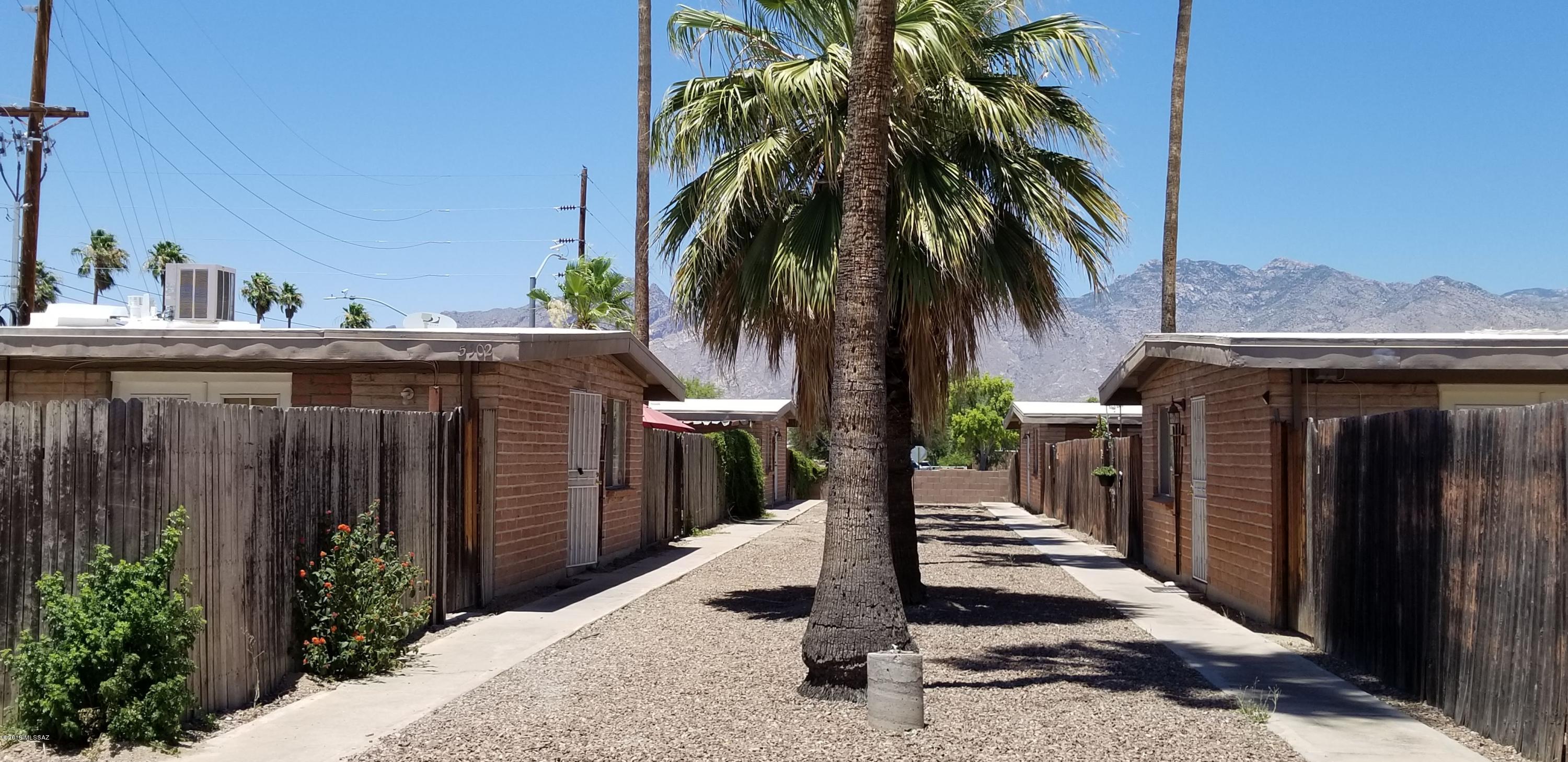 Awesome well cared for burnt adobe 4-plex located across the street from Fort Lowell Park and walking distance to Tucson Medical Center.  Very spacious units with (2) 3Brs, 2Ba, 1,144 SF units and (2) 2Brs, 1Ba, 900 SF UNITS.  4 covered parking spaces and all have fenced yards.  Newly coated roofs.  Please do not disturb tenants.