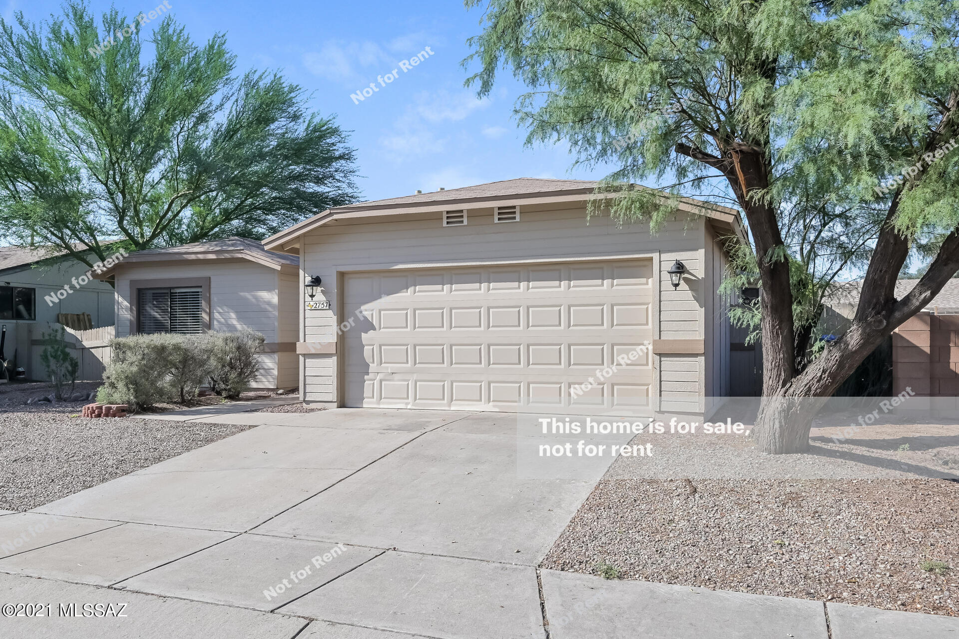 This Tucson one-story home offers a patio, and a two-car garage.