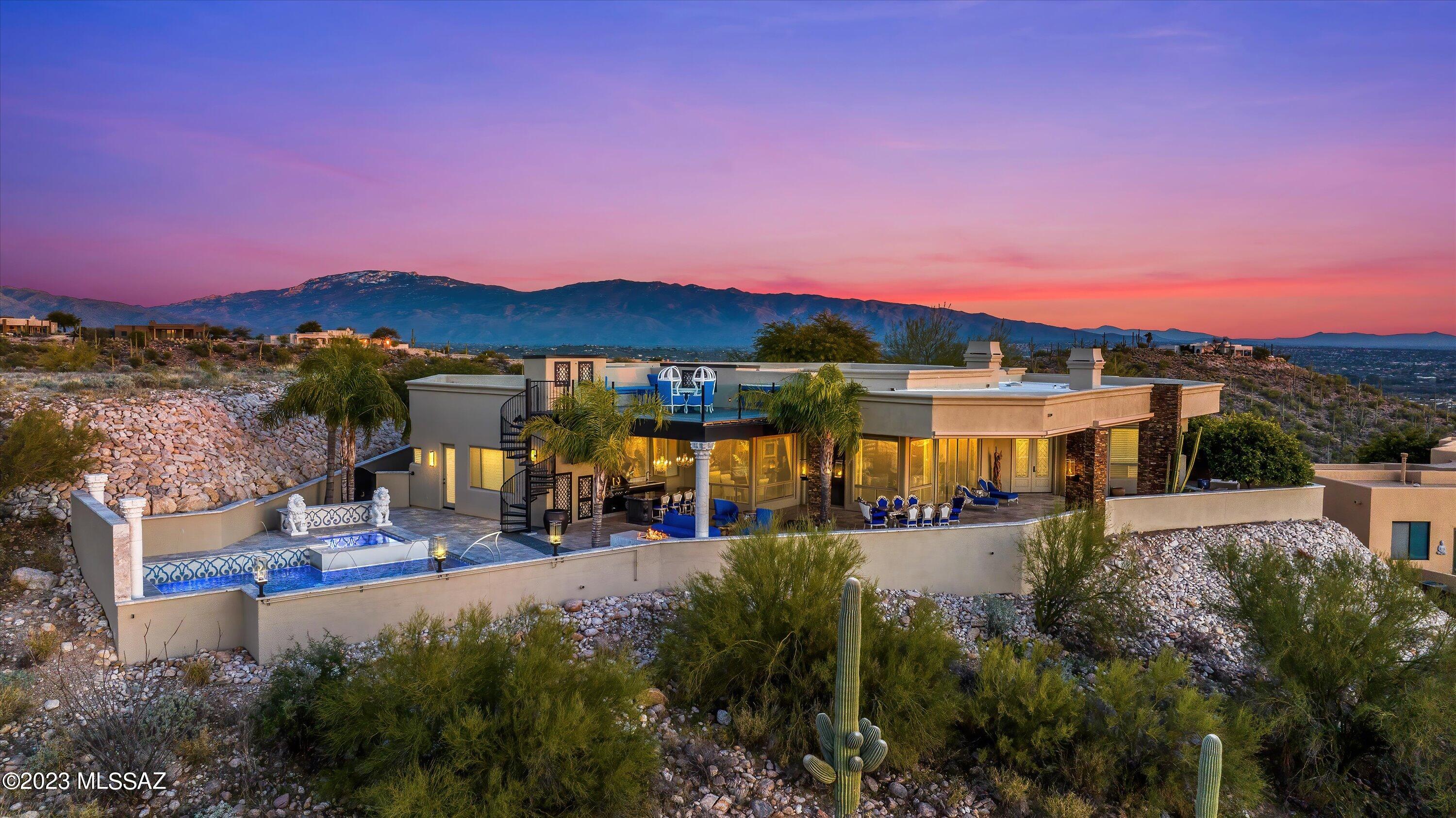 Home Tour Winner! Lions' Lair A Stunning Hilltop Retreat with Breathtaking Views in Prestigious Gated Sabino Mountain. Masterfully Designed Tuscan Style Single Story. Elegant Gated Courtyard & Wrought Iron Doors. Exquisite Great Room with High Ceilings, Fireplace, Walls of Windows, Travertine Floors & Gourmet  Wet Bar. Chef's Kitchen Showcases Large Granite Island & High-End Appliances. Magnificent Owner's Retreat with Marble Floors, Fireplace, Sensational Shower & Huge Luxurious Walk-in Closet. Fabulous Full Length Back Patio, Outdoor Kitchen, Fireplace, Pool, Spa, Waterfall & Upper Viewing Deck. Convenient Foothills Location minutes from World-Class Resorts, Schools, Restaurants & Shopping. Offered Fully Furnished. See Upgrade List, 3D Tour, Floor Plan & Video. Indulge in Complete Luxury